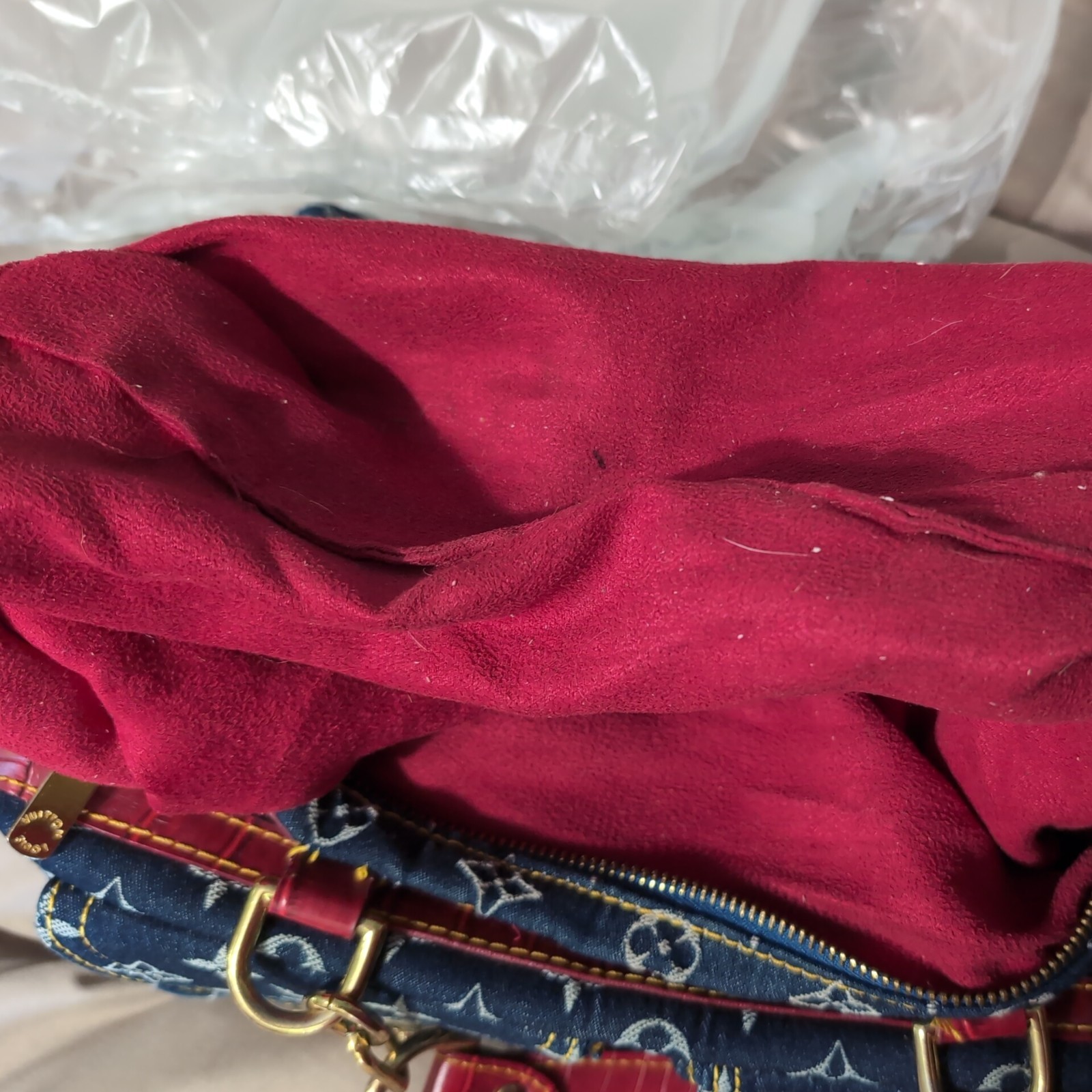 Louis Vuitton blue demin with red alligator trim
