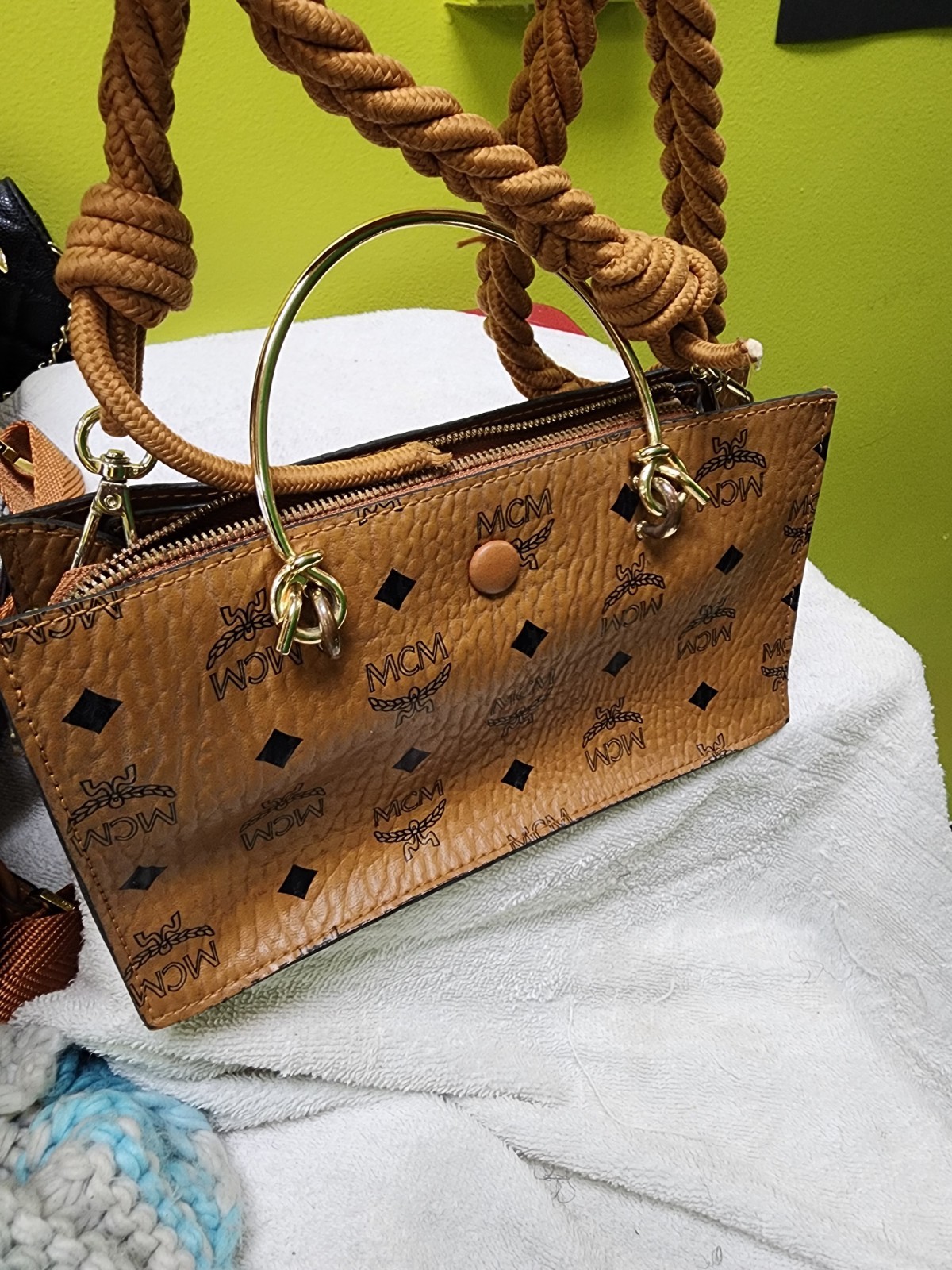 MCM Brown Logo Top Handle Bag Zip Closure, Rope Strap, Gold Hardware, Pockets