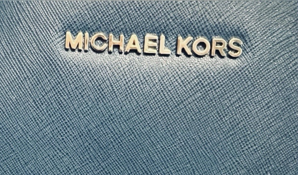 Michael Kors Blue ToteBag – One call out on one handle piping. See last photo.