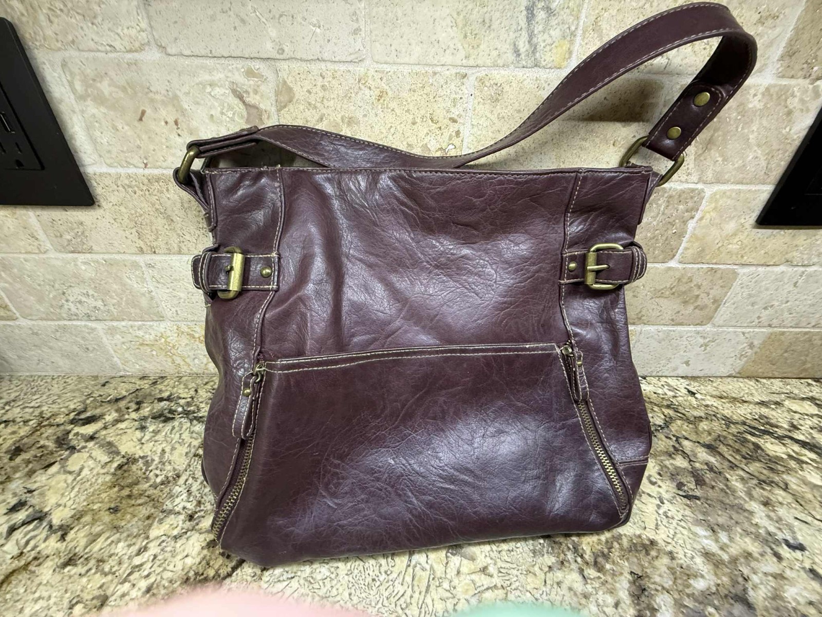 No name: maroon slouchy hobo-style leather handbag with gold buckles