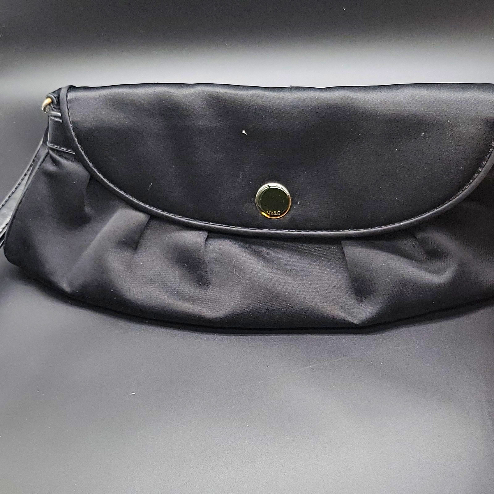 NY&Co black wristlet clutch, magnetic closure, inner zip pocket, Evening Bag