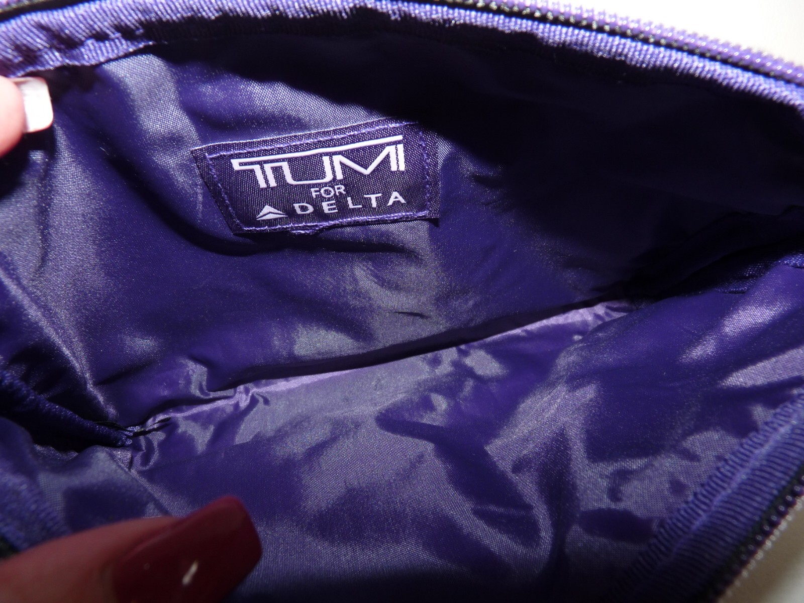 TUMI Delta Small Bag Colors Black and Purple