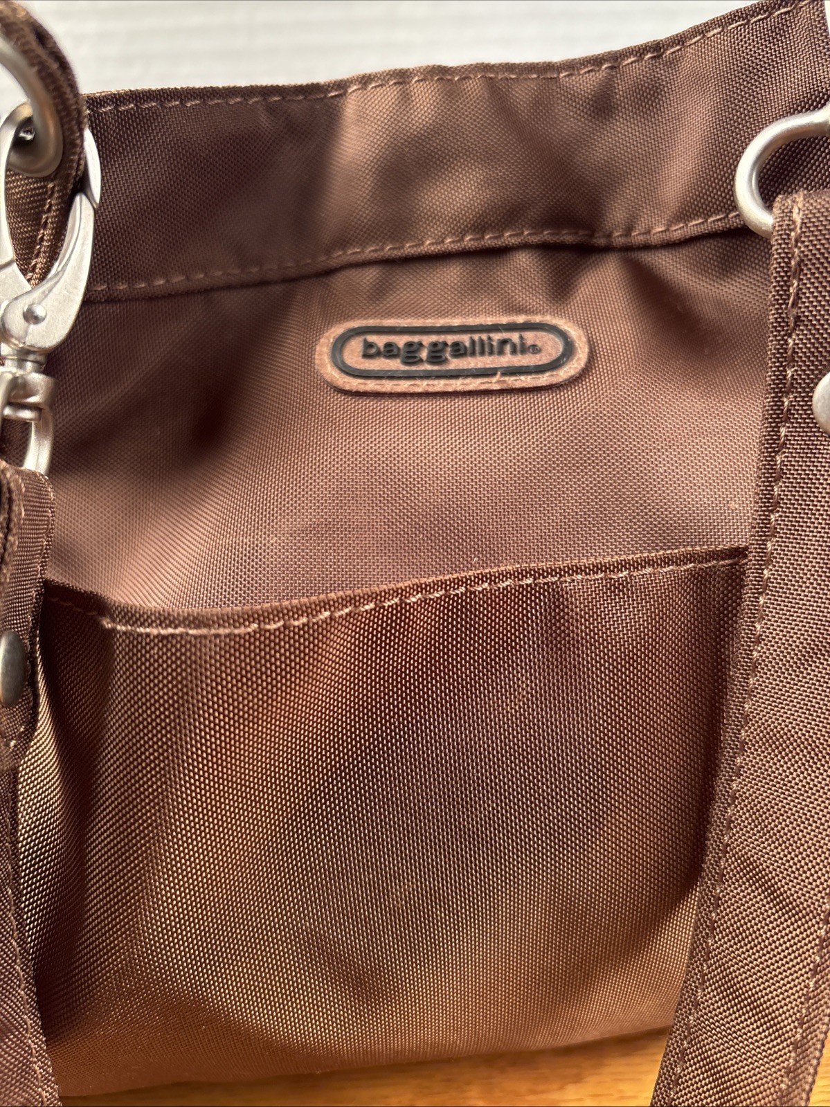 Brown Baggaliini 8 1/2 In Tall Snap Closure Nylon Like Material