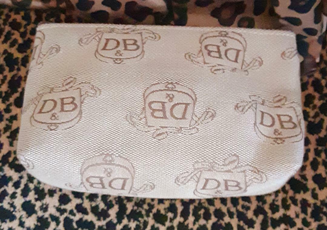 DOONEY & BOURKE DONEGAL CREST SIGNATURE- TAN & BROWN CLUTCH, MAKEUP BAG, ETC!!!