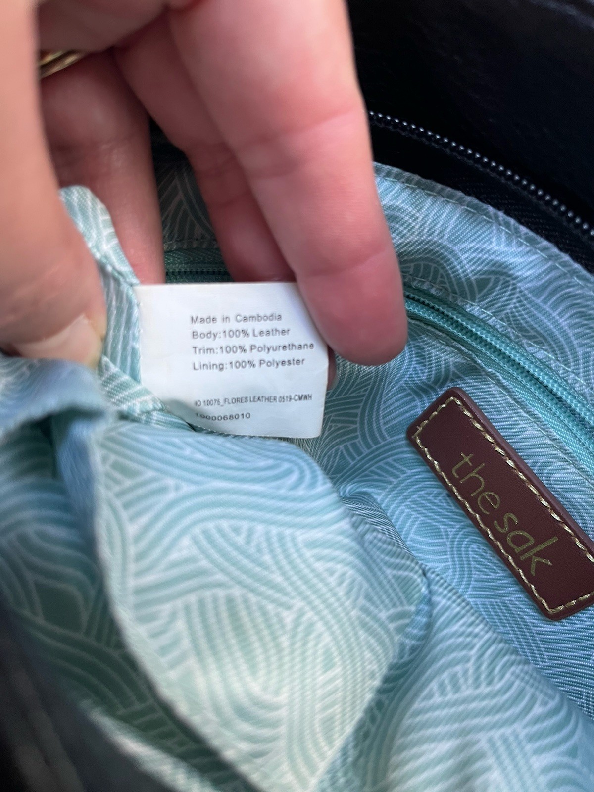 The Sak Black Indio Pebble Leather Hobo Purse Teal Interior