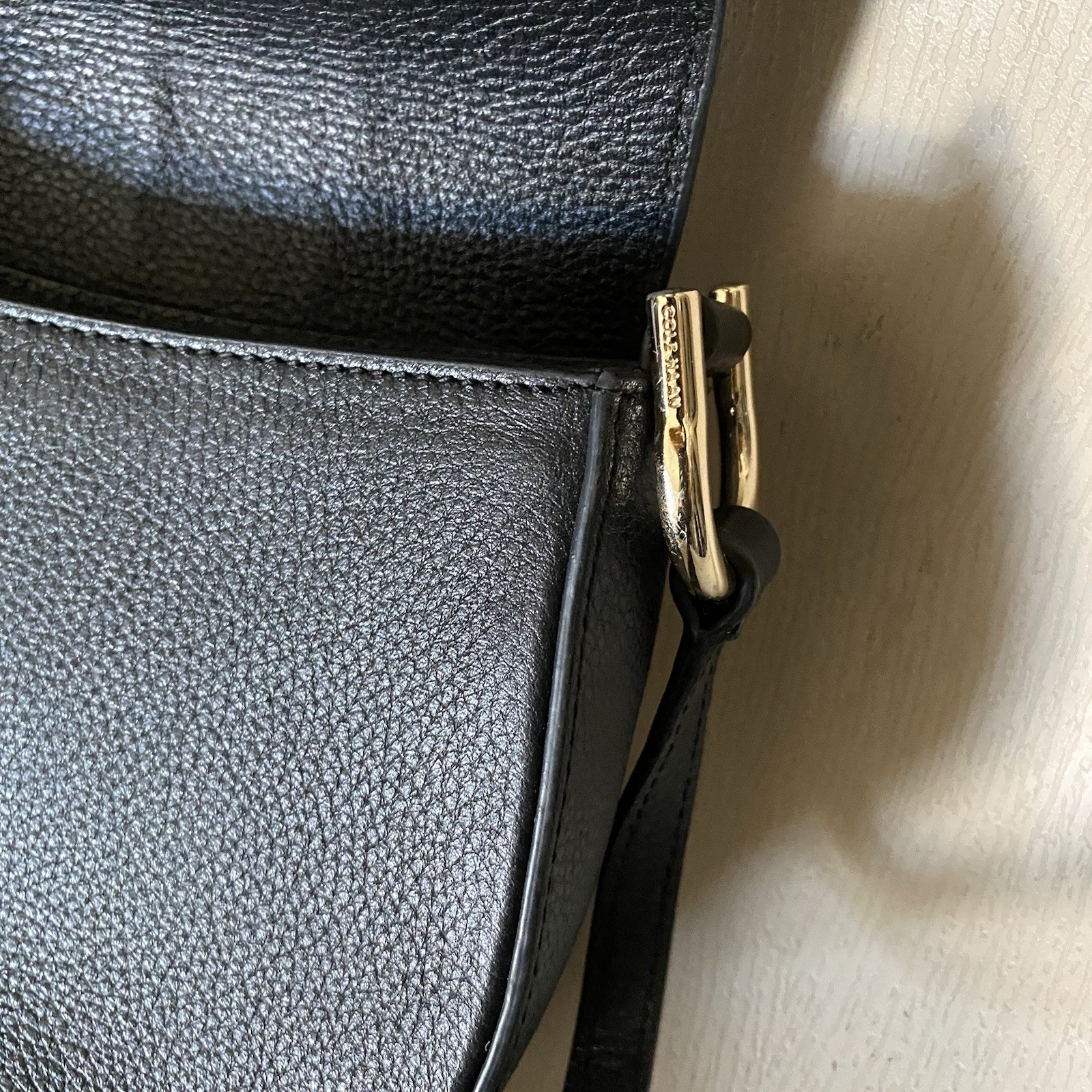 Cole Haan Grand Series black pebble leather crossbody saddle bag