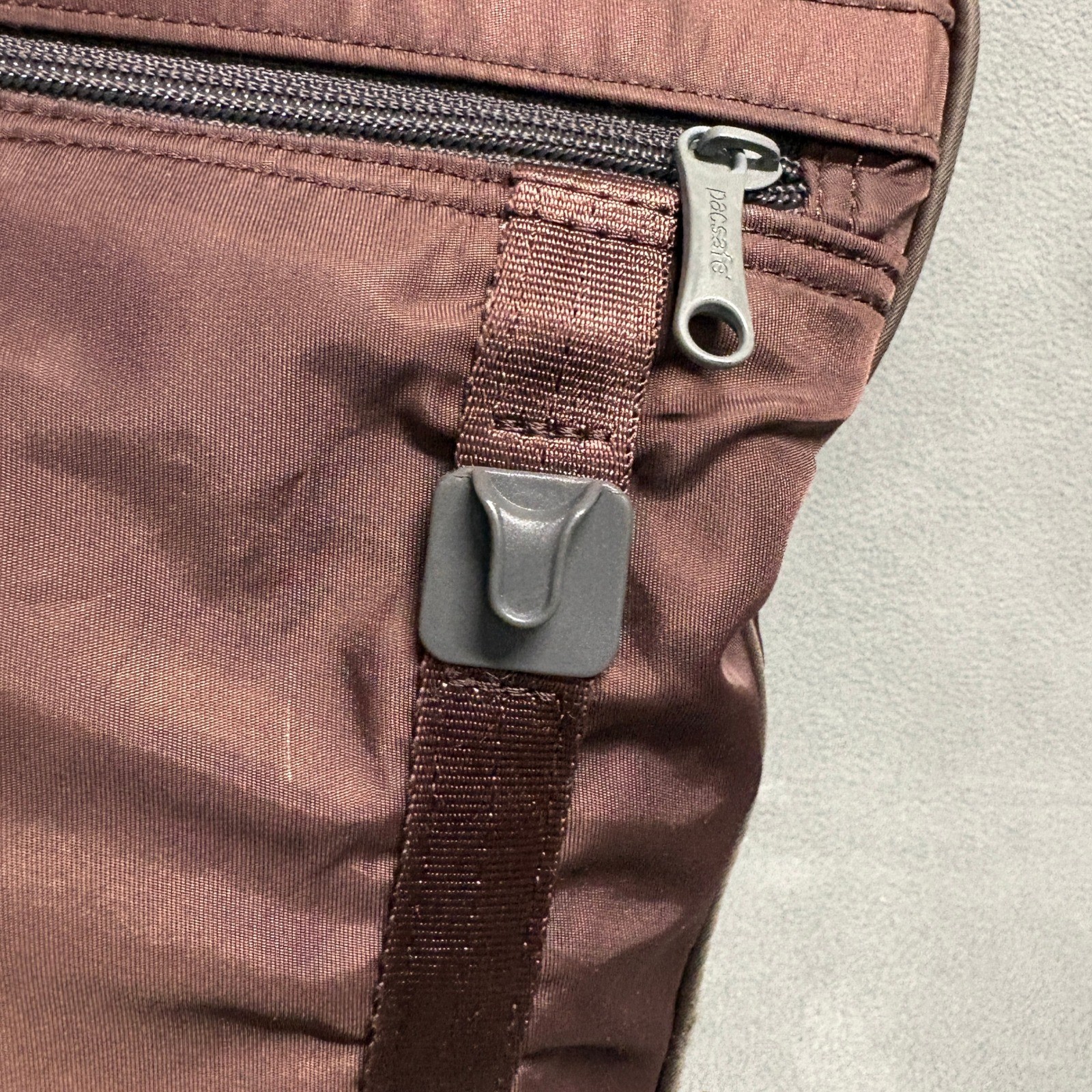 PACSAFE SlingSafe 100 Exomesh Anti-Theft Safety Crossbody Bag in Brown