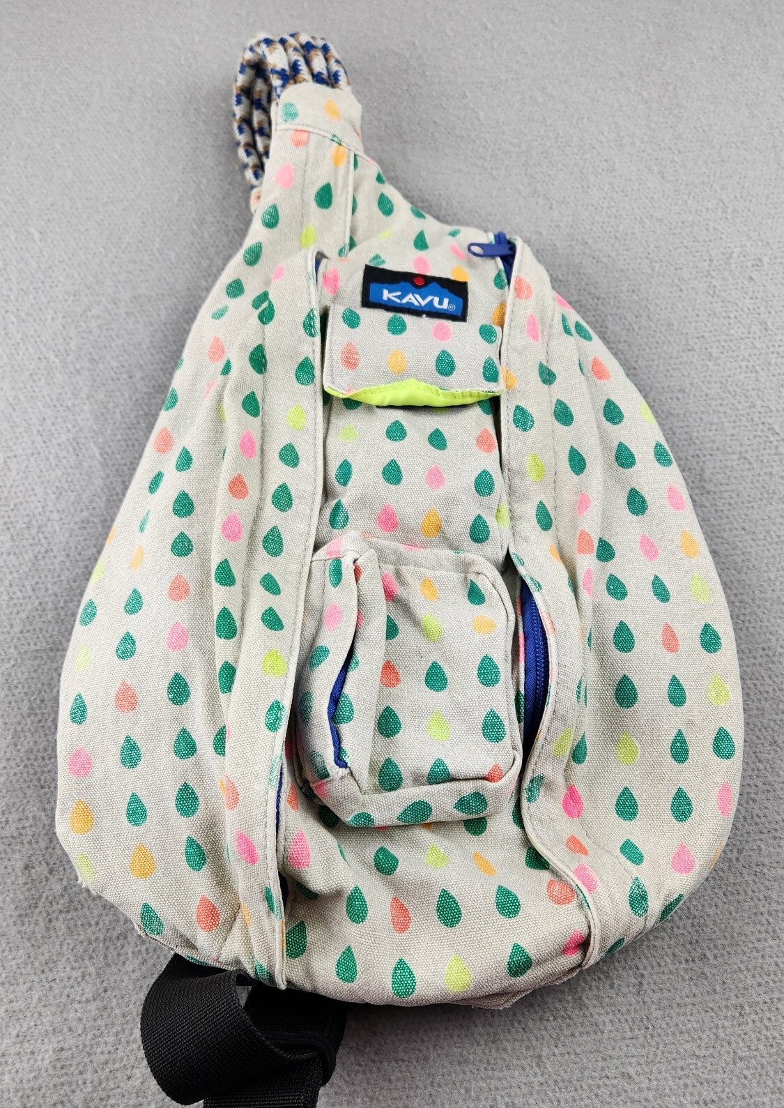 KAVU Rope Sling Backpack Crossbody Canvas Bag Beige Retro Rainbow Raindrops