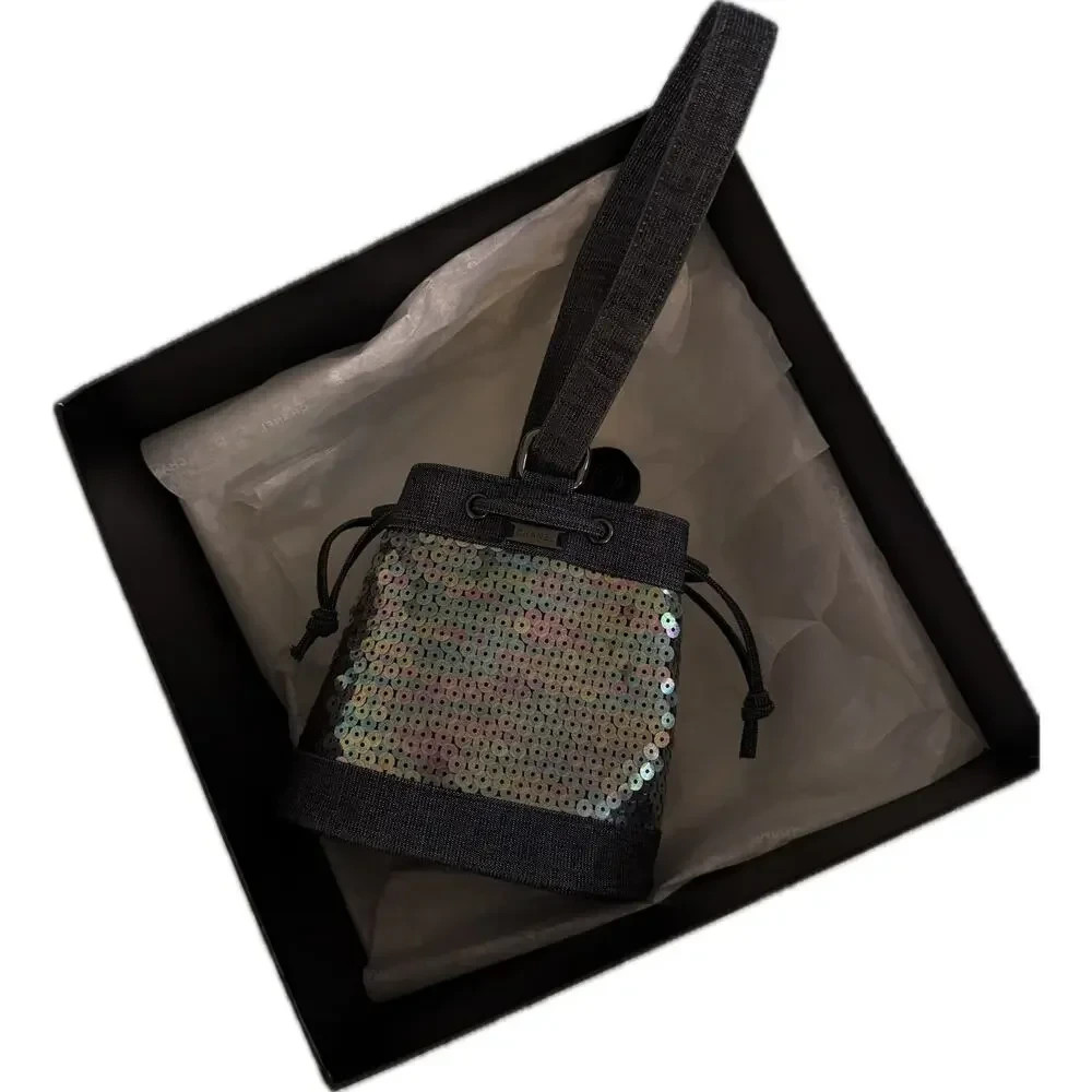 vintage chanel karl lagerfeld sequin denim bucket bag (1997–1999)