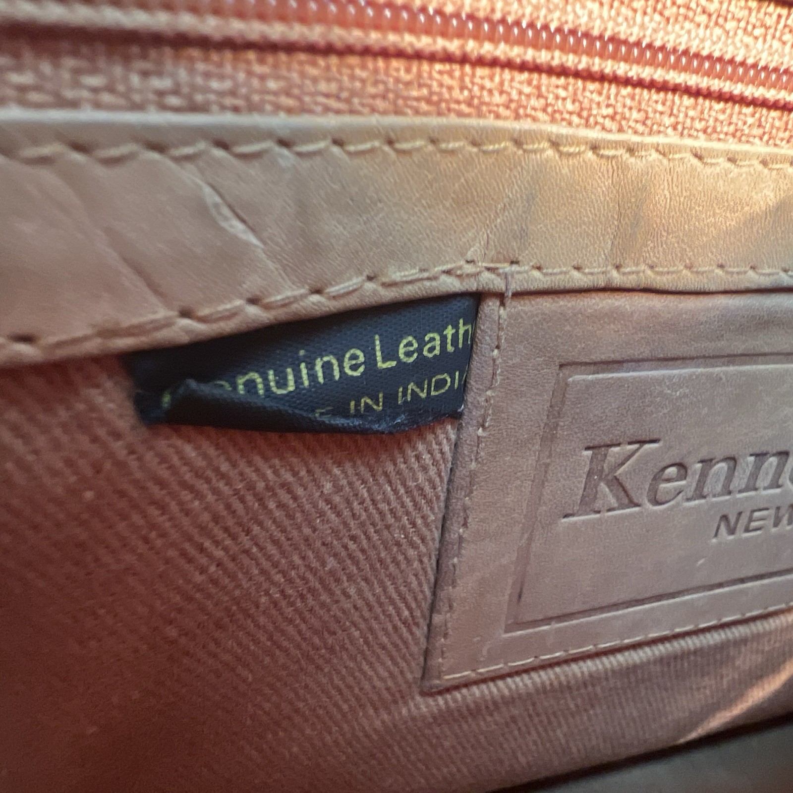 Kenneth Cole New York Brown Embossed Shoe Pattern Zip Clutch Wrist Strap