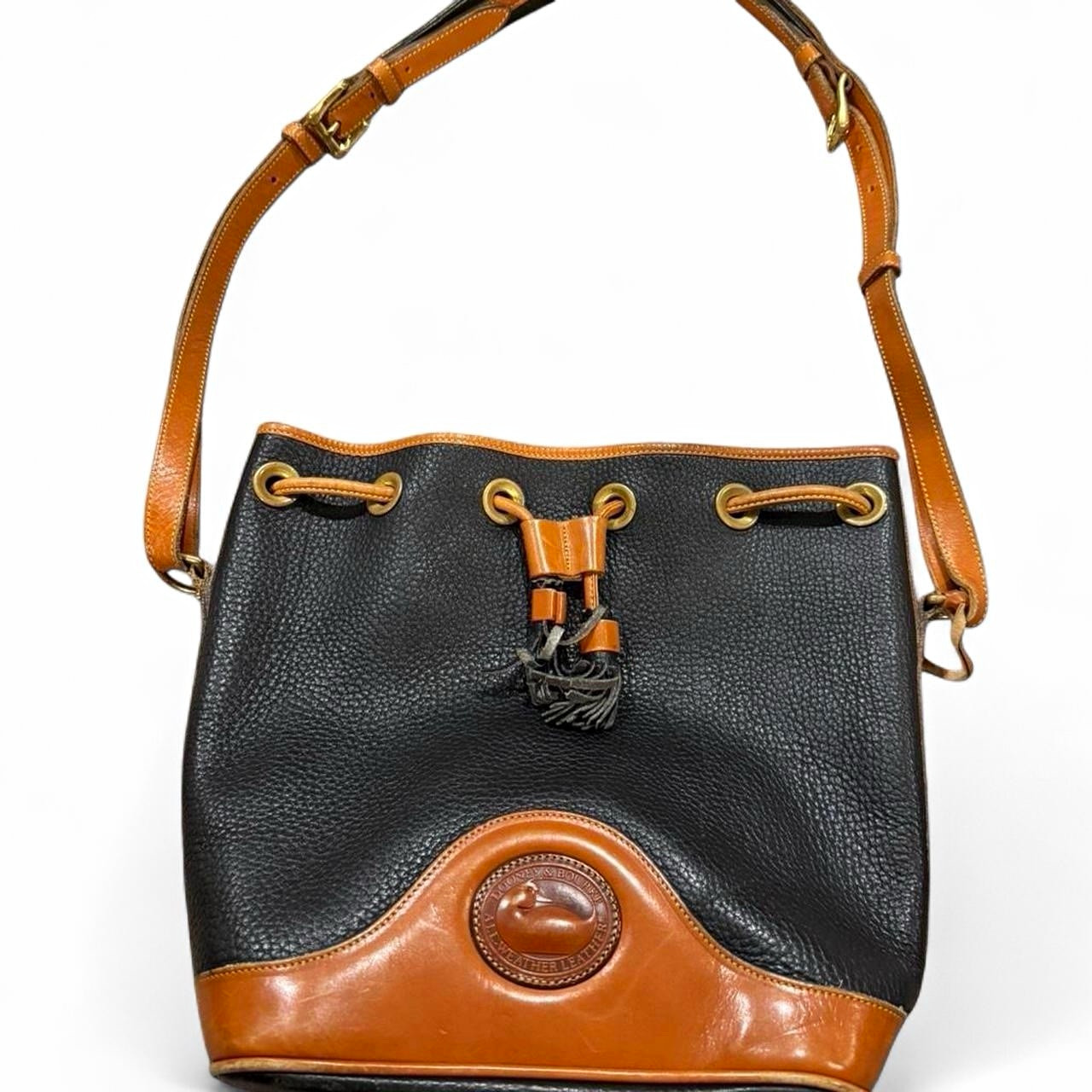 Dooney & Bourke AWL Pebbled Drawstring Bucket Bag Black/Brown Tassel Det Strap