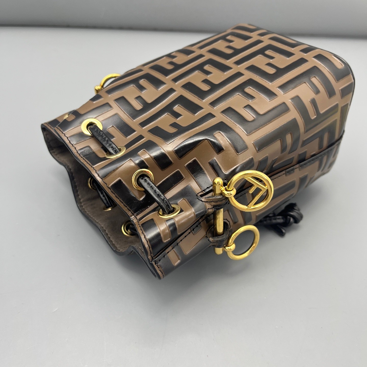 FENDI Mon Tresor Bucket Crossbody Bag FF Mini Black Brown Embossed Leather Gold
