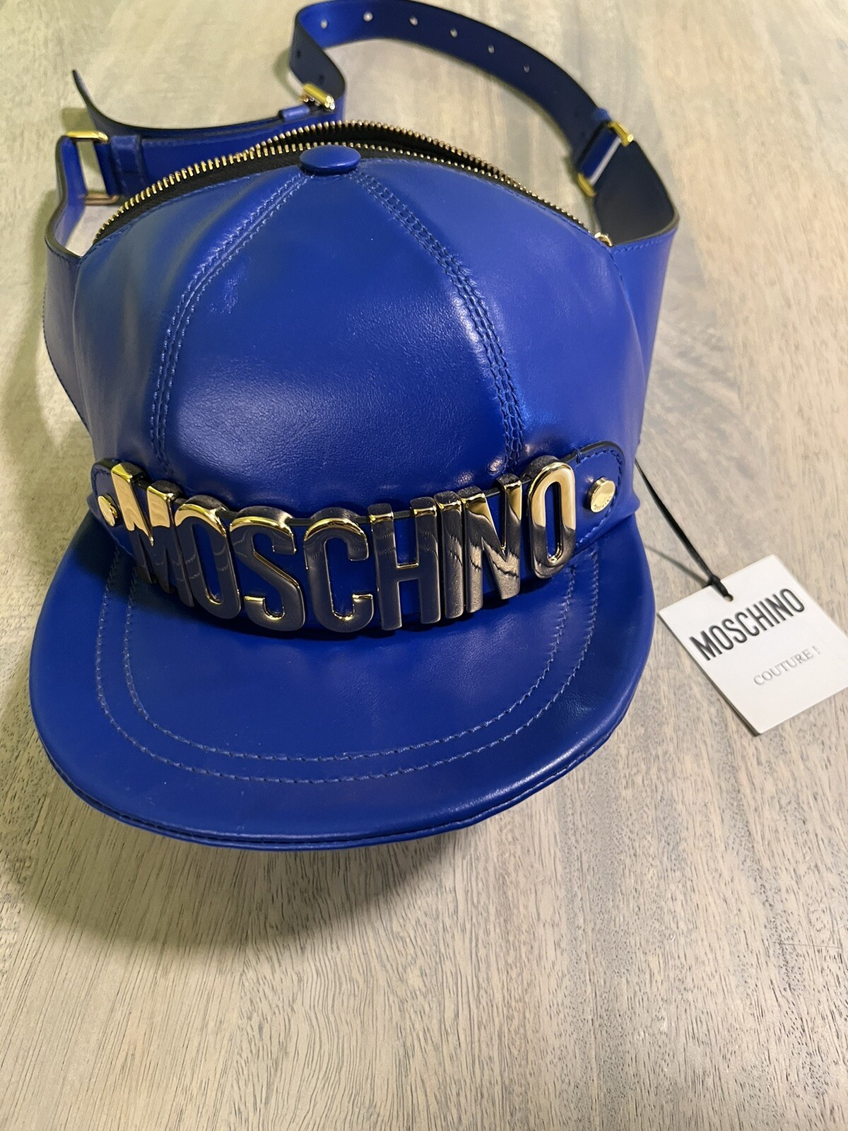 AW20 Moschino Couture Jeremy Scott LEATHER HAT SHAPED FANNY PACK BLUE GOLD LOGO.