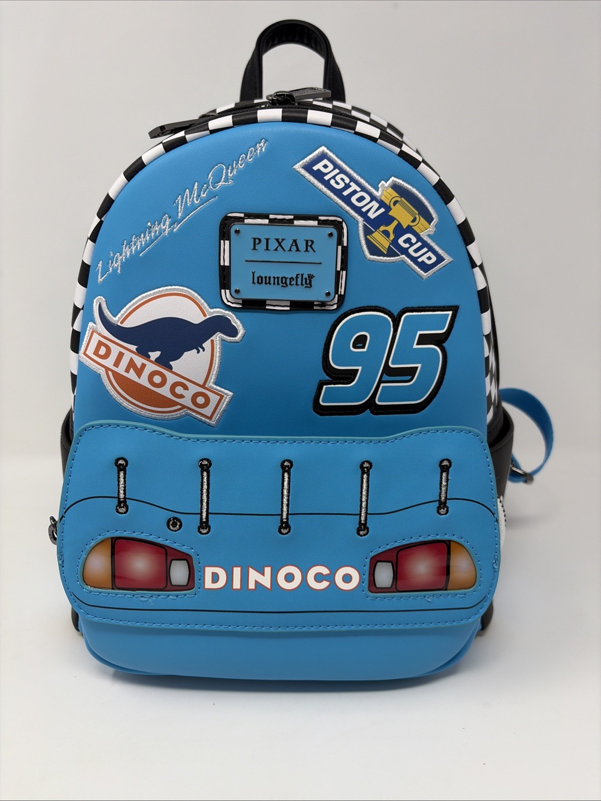 Loungefly Disney Pixar Cars Lightning McQueen Dinoco Light-Up Mini Backpack NWT