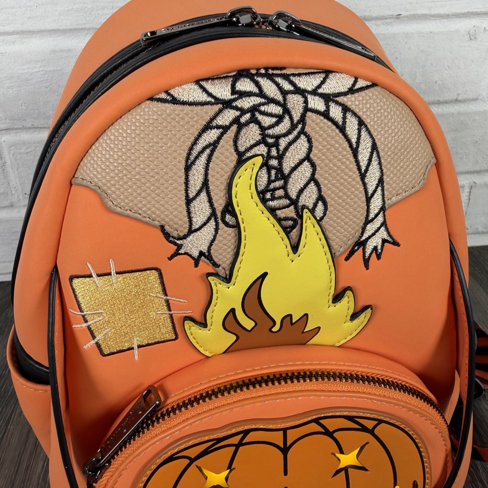 Loungefly Trick ‘R Treat Flaming Pumpkin Head Sam Light Up Glow Mini Backpack
