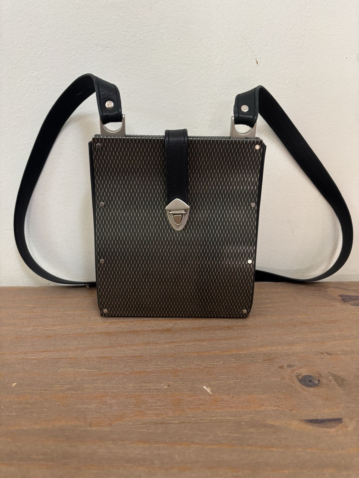 Wendy Stevens industrial stainless steel and leather drop bag mini $595