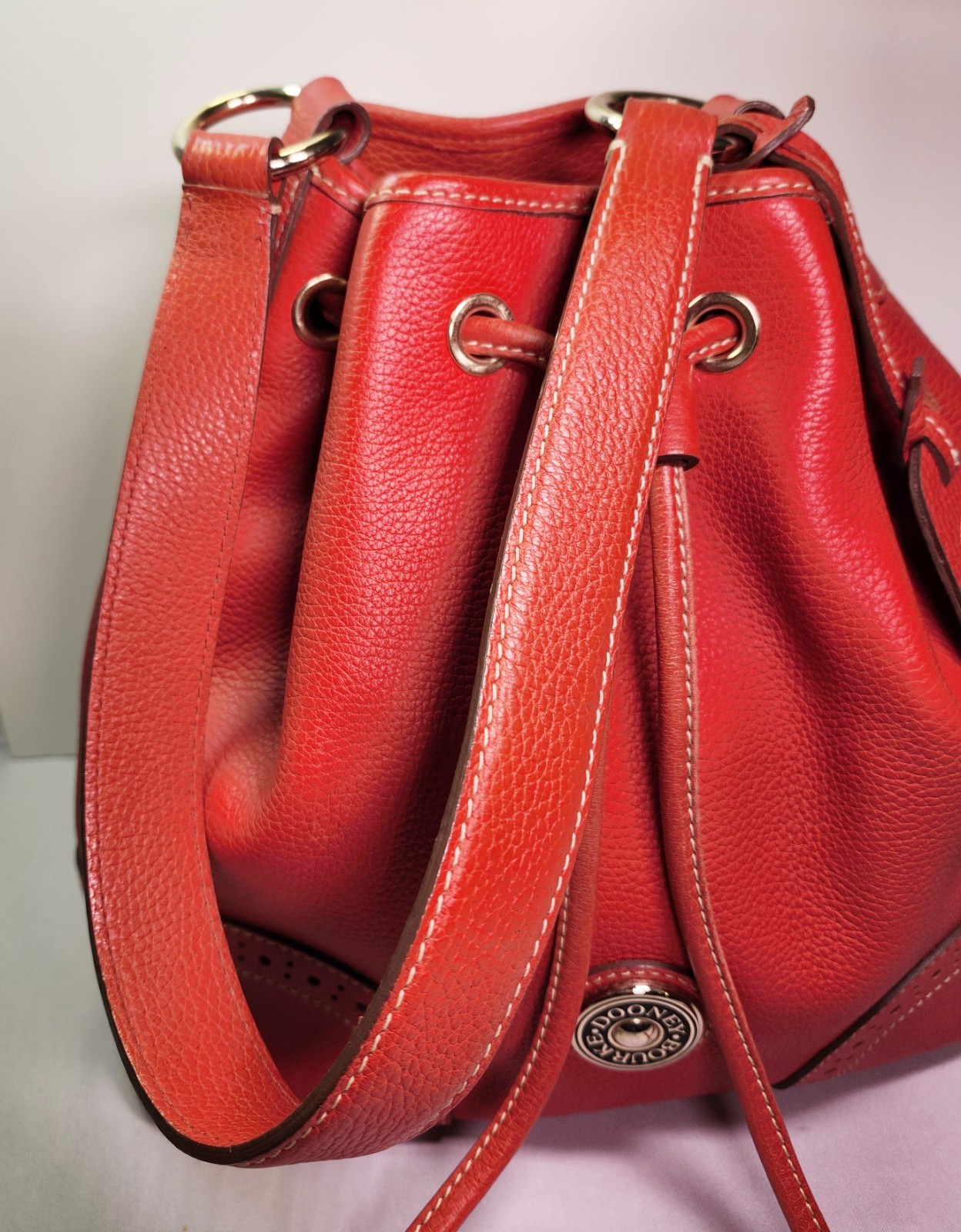 Dooney & Bourke Pebble Leather Red Tassel Satchel • Raised Button Logo J7343515