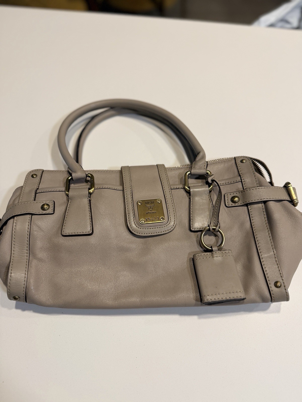 MCM Gray Logo Satchel Top Handle Zip Lined Inner Pockets Buckle Charm Gold