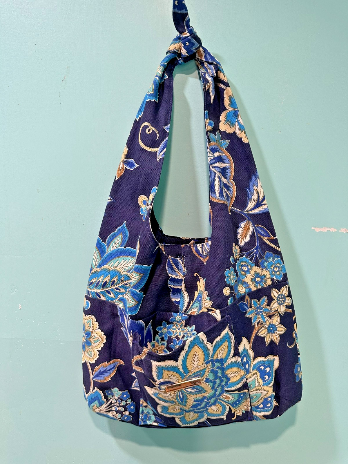 Shoulder bag, Hook and loop closure. Pocket on front and one on inside.