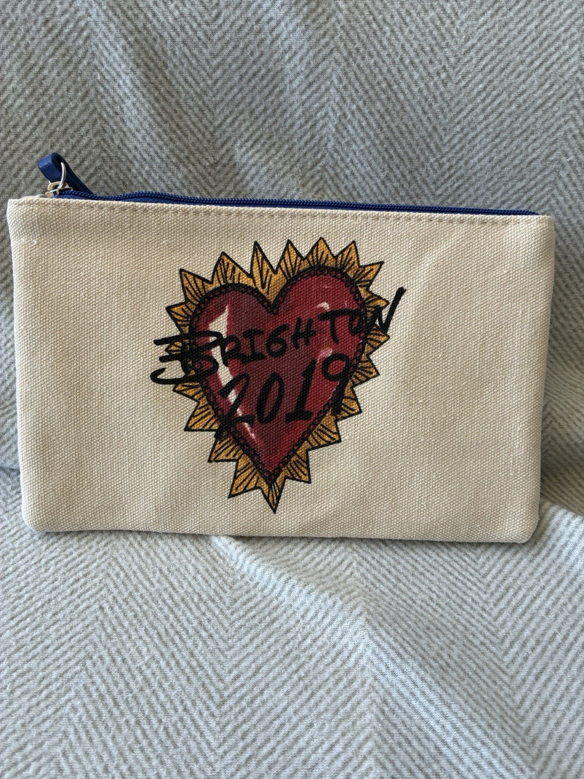 Brighton Beige Canvas Wristlet with Red Heart and Gold Burst
