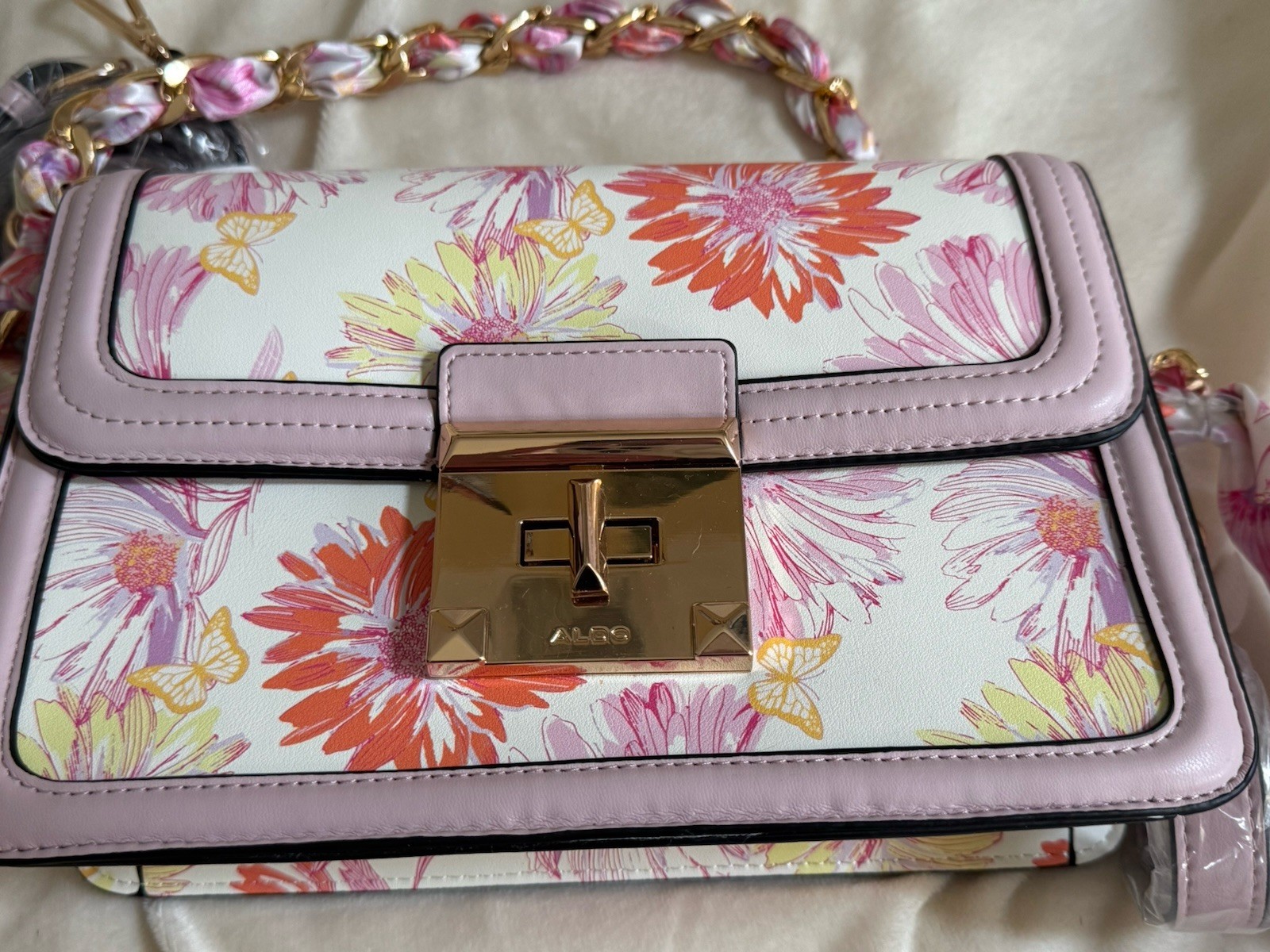 Brand new Aldo bag. 2 additional handle accessories. beautiful scarf wrapping.