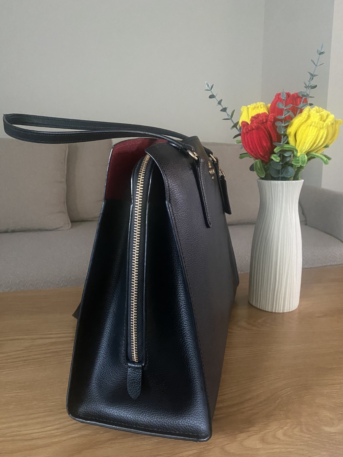Coach Tatum Carryall 40 tote bag in black/true red. Used, in good condition.