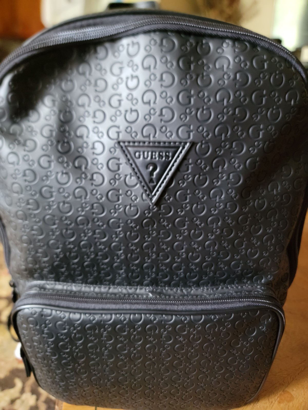 GUESS Women’s Black Embossed Logo Zip Backpack with Front Zip Pocket