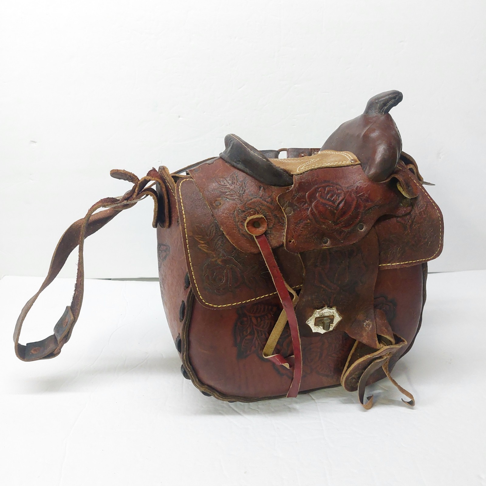 Vintage Tooled Rose Embossed Leather Saddle Shaped Shearling-Lined Purse Bag