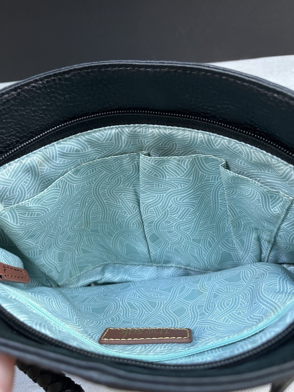 The Sak Black Indio Pebble Leather Hobo Purse Teal Interior