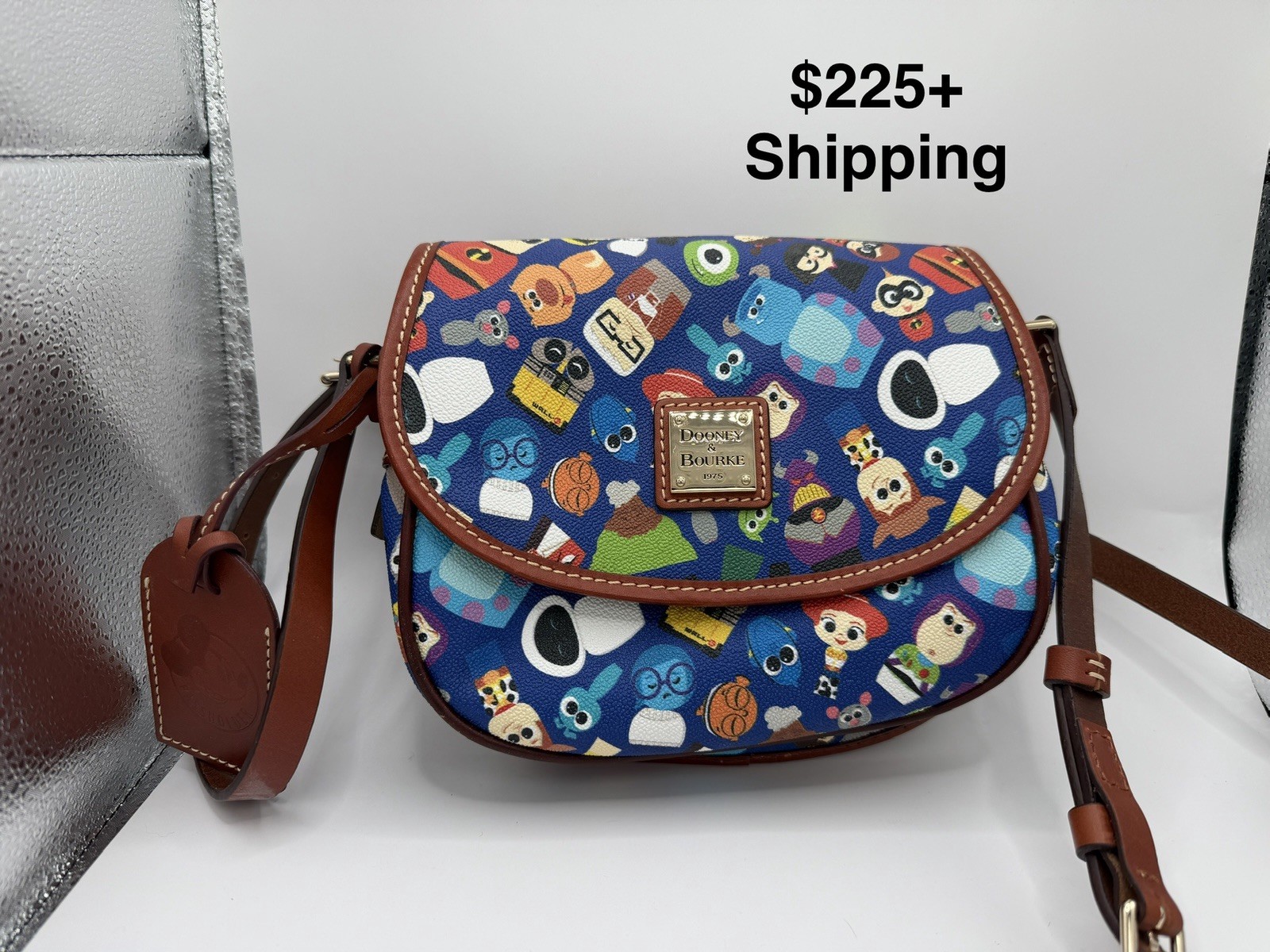 Dooney & Bourke Disney Pixar Character Print Crossbody Flap Bag Blue Gold