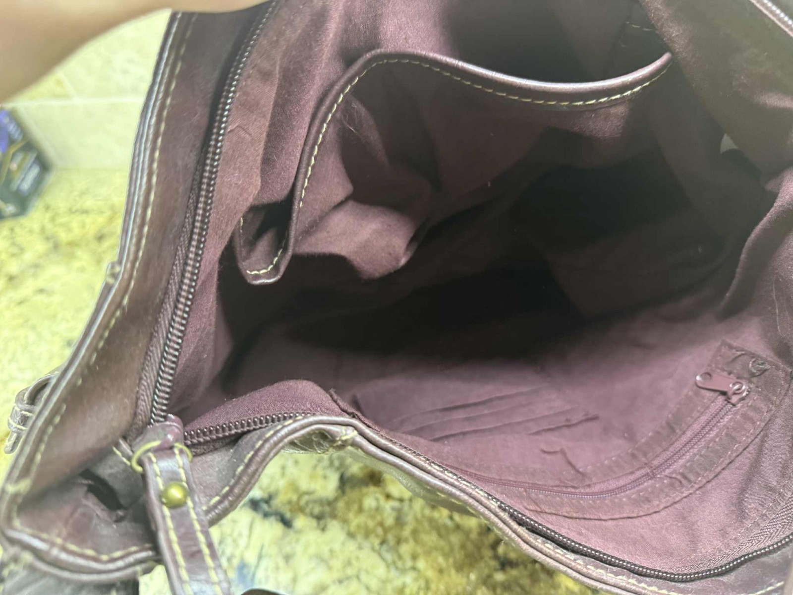 No name: maroon slouchy hobo-style leather handbag with gold buckles