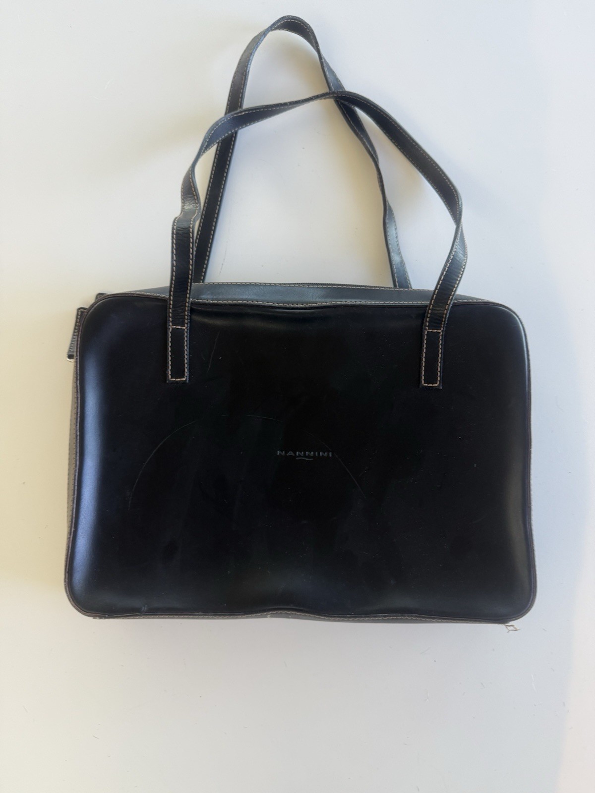 Nannini brown leather shoulder bag. fits small laptop or ipad