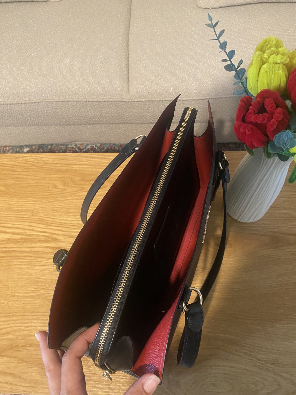 Coach Tatum Carryall 40 tote bag in black/true red. Used, in good condition.