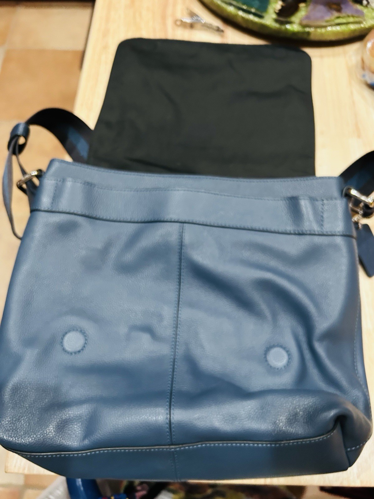 Coach Charles Messenger Bag in a deep blue leather.