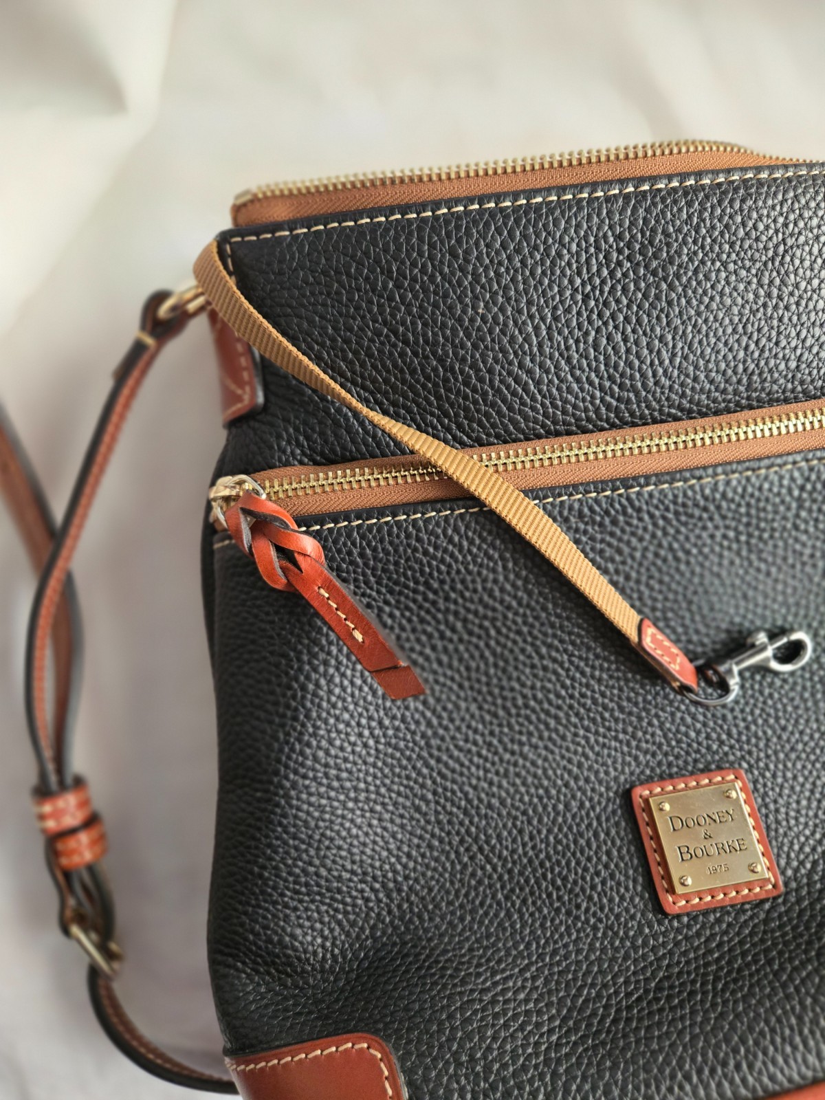 Dooney & Bourke Black Pebbled Grain Leather Crossbody With Brown Trim & Strap