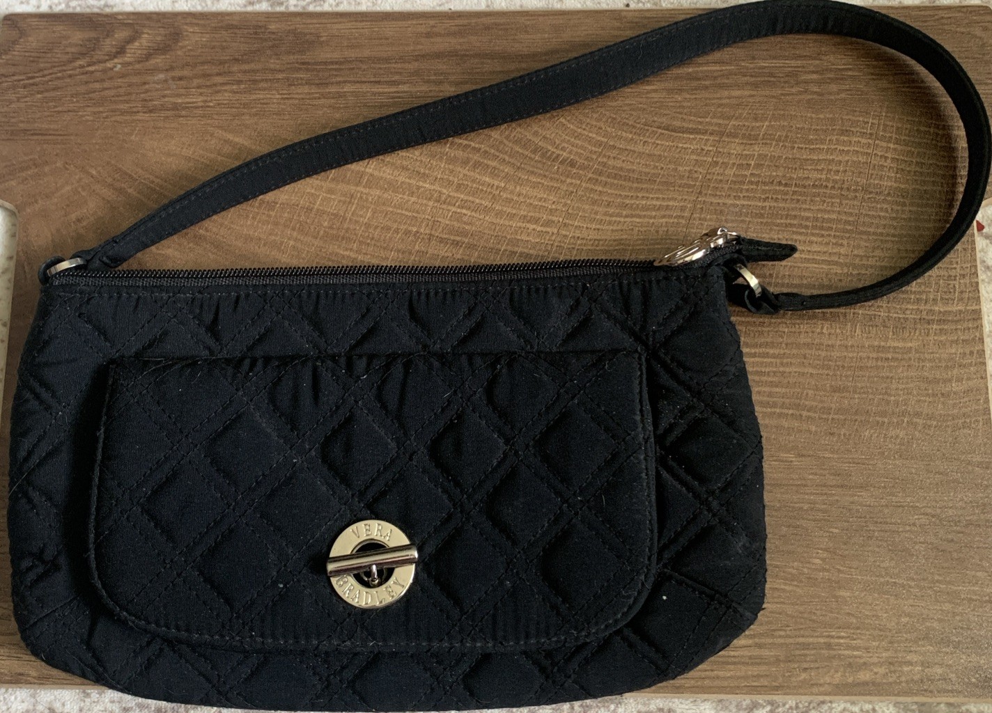Vera Bradley small black bag-silver hardware-approx 10.5 x 6 in-phone pocket
