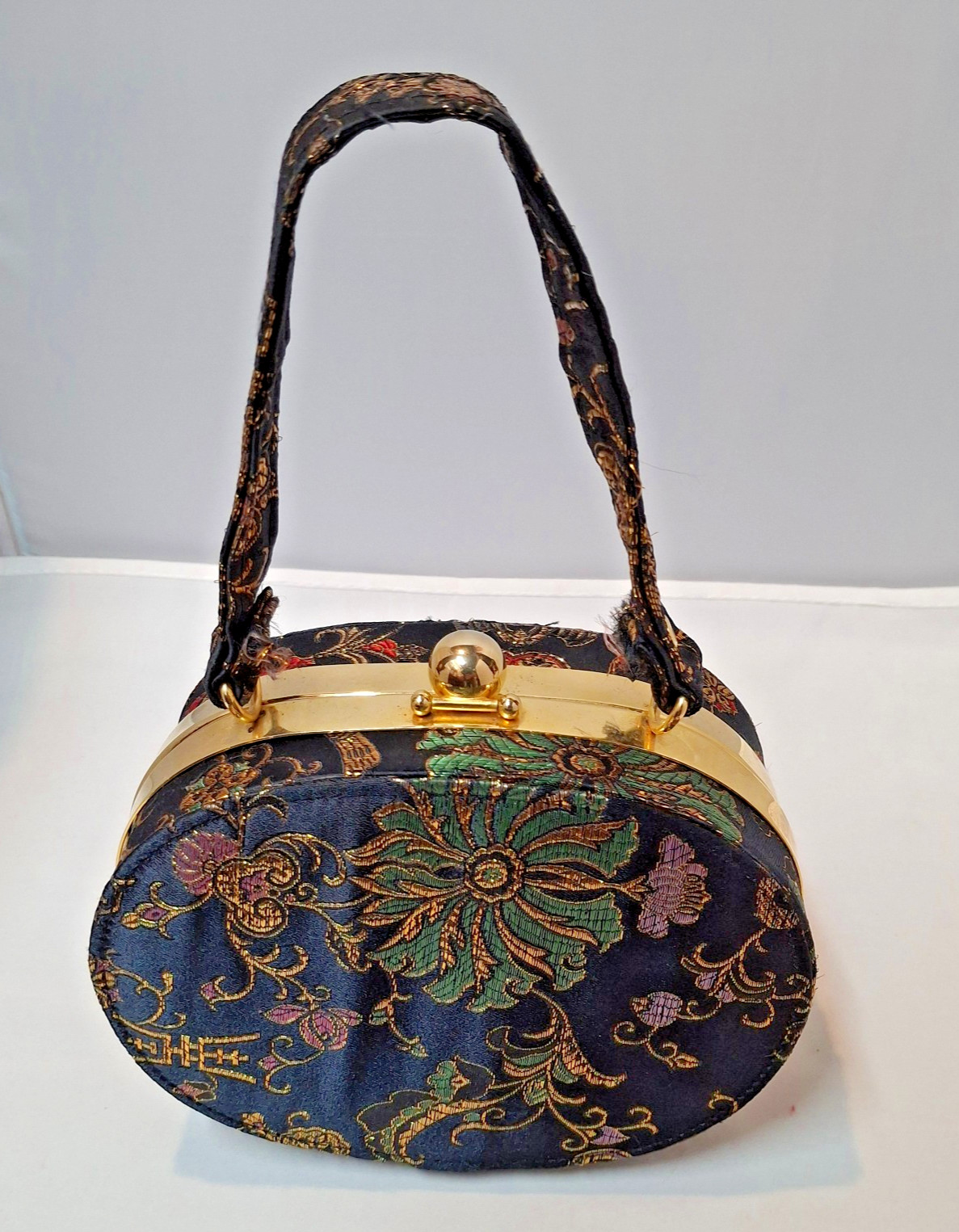 Vintage style oval oriental tapestry flower design handbag with brass kiss clasp
