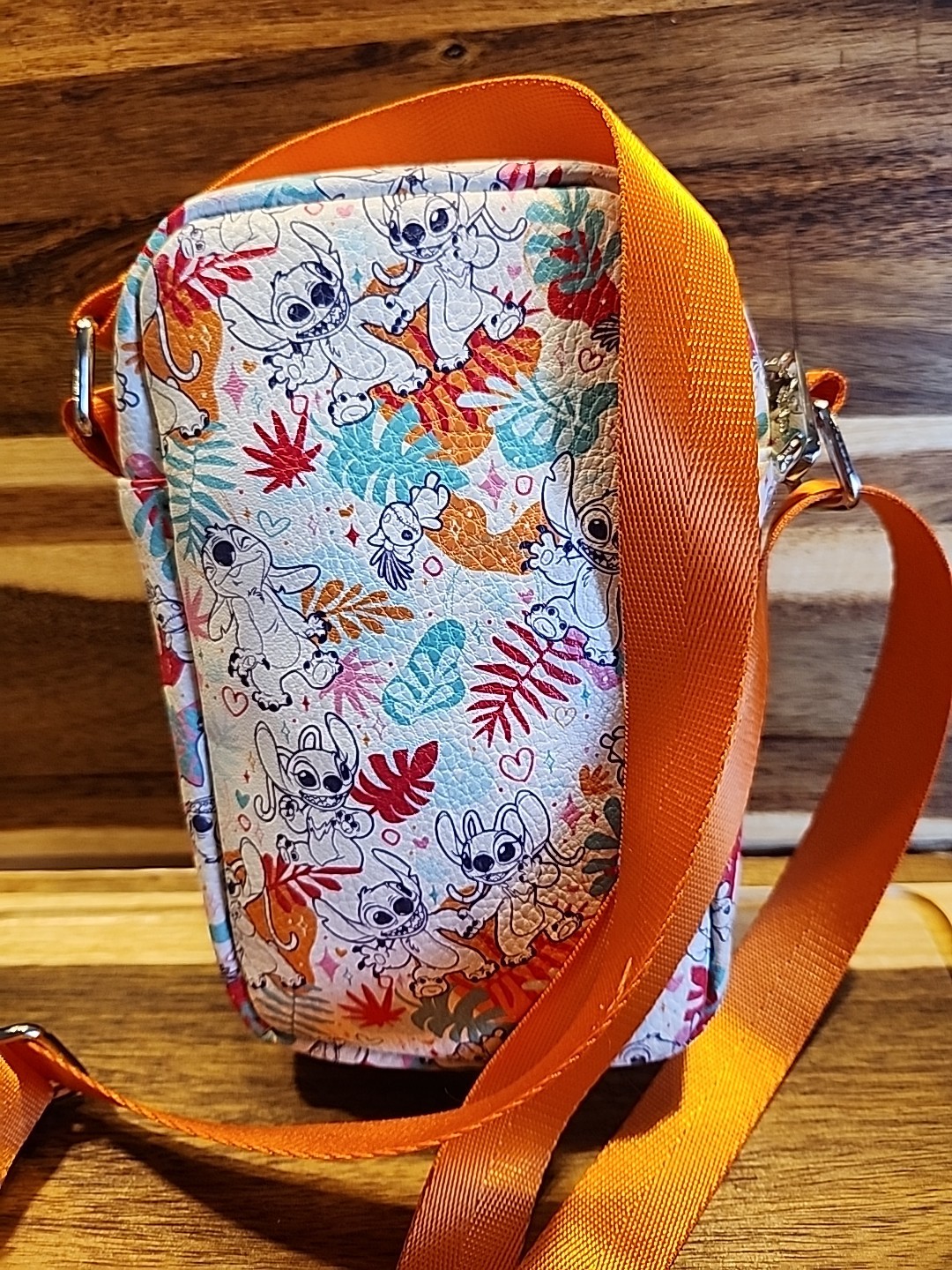 Buckle-Down Disney Lilo and Stitch crossbody bag pattern on vegan leather.