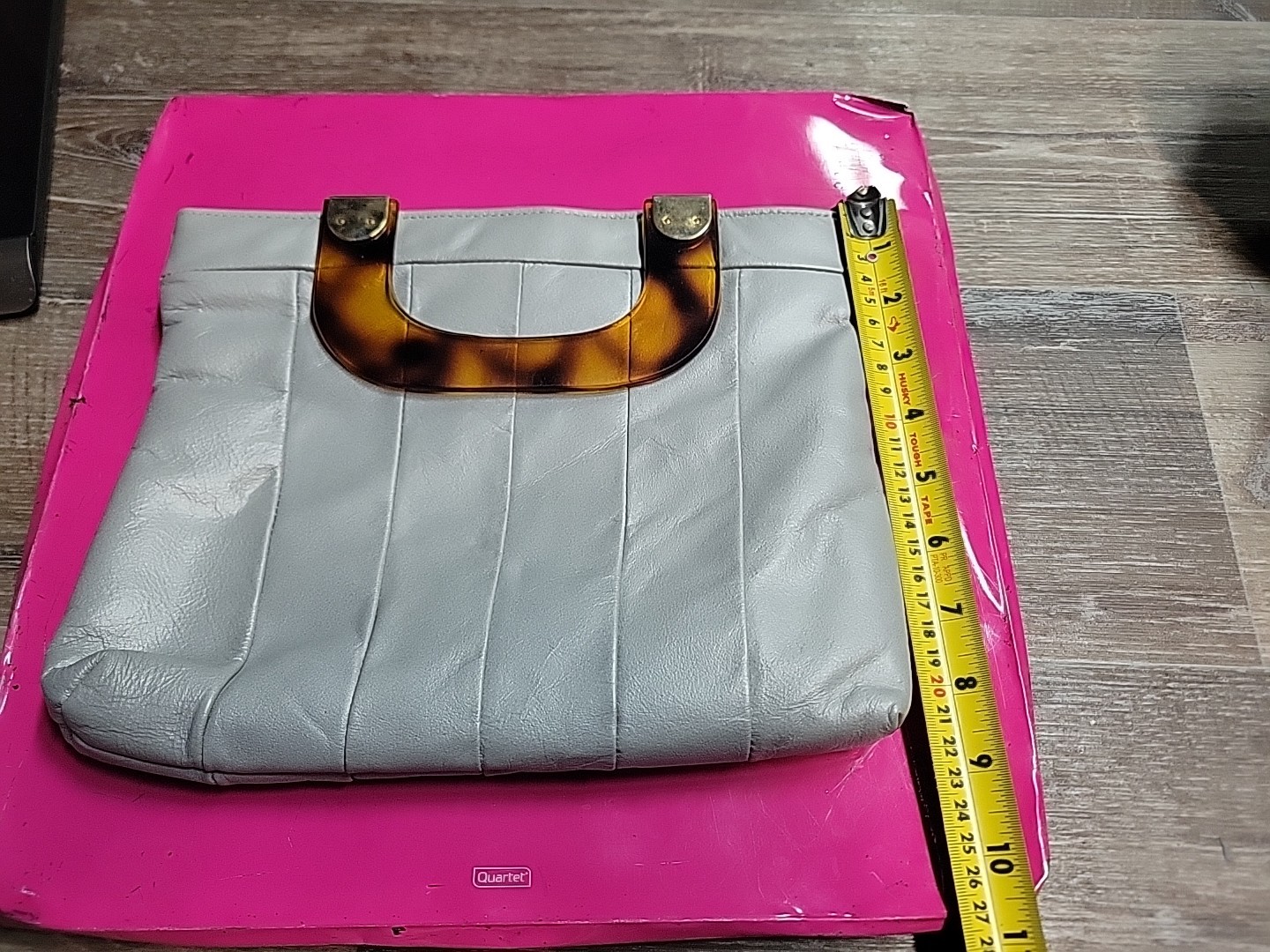 Grey leather handbag with a tortoise handle clutch purse