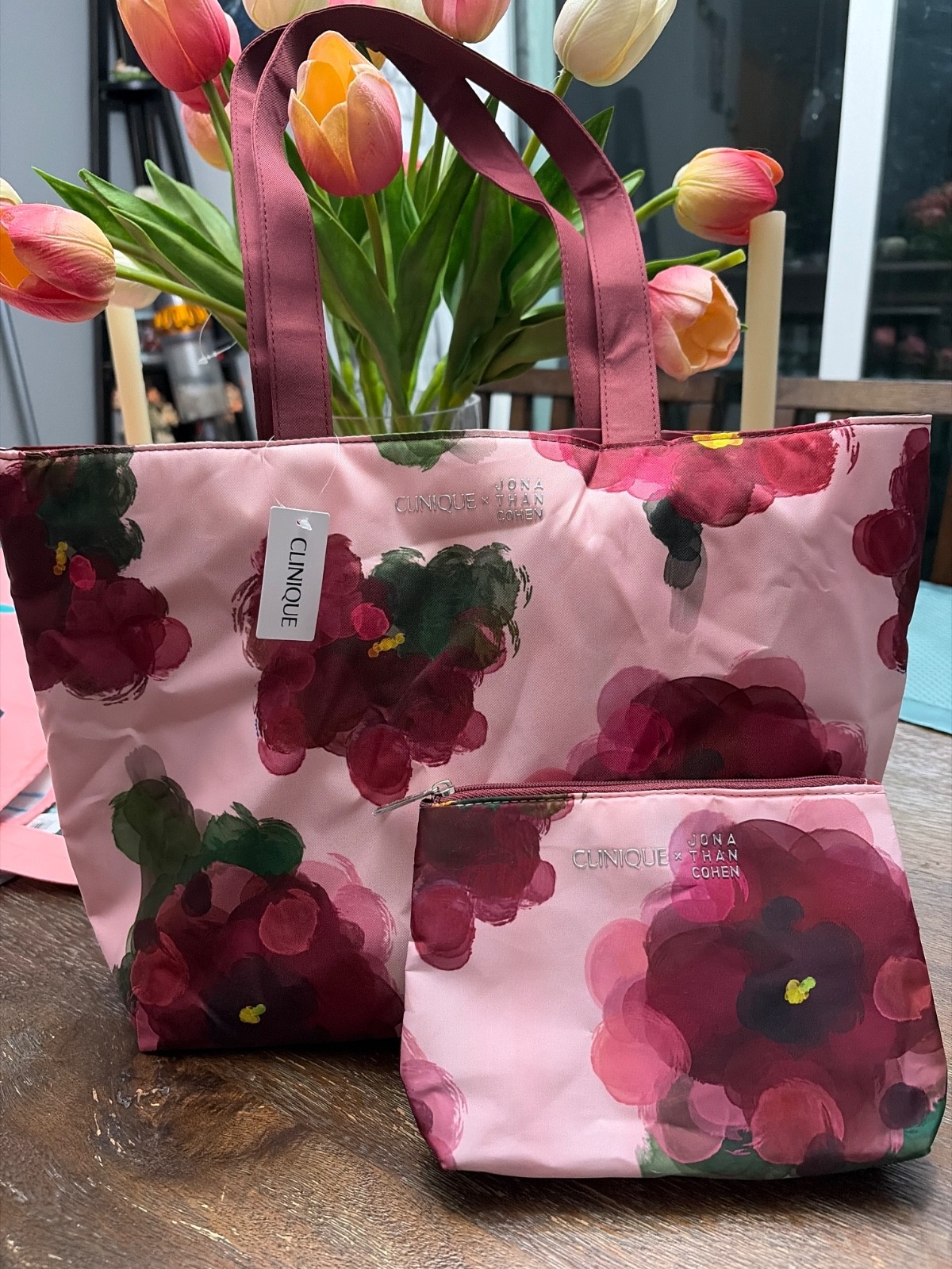 clinique x JONATHAN COHEN tote bag size medium with matching makeup bag.