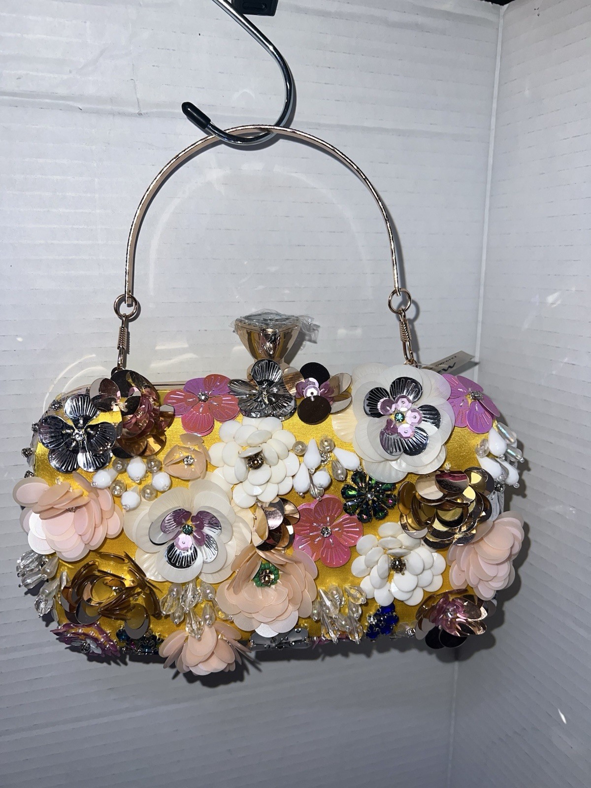 Bebe Daisy Chain Crossbody Clutch. Size: Wx8”, Hx5.9”, Dx1.9” NWT