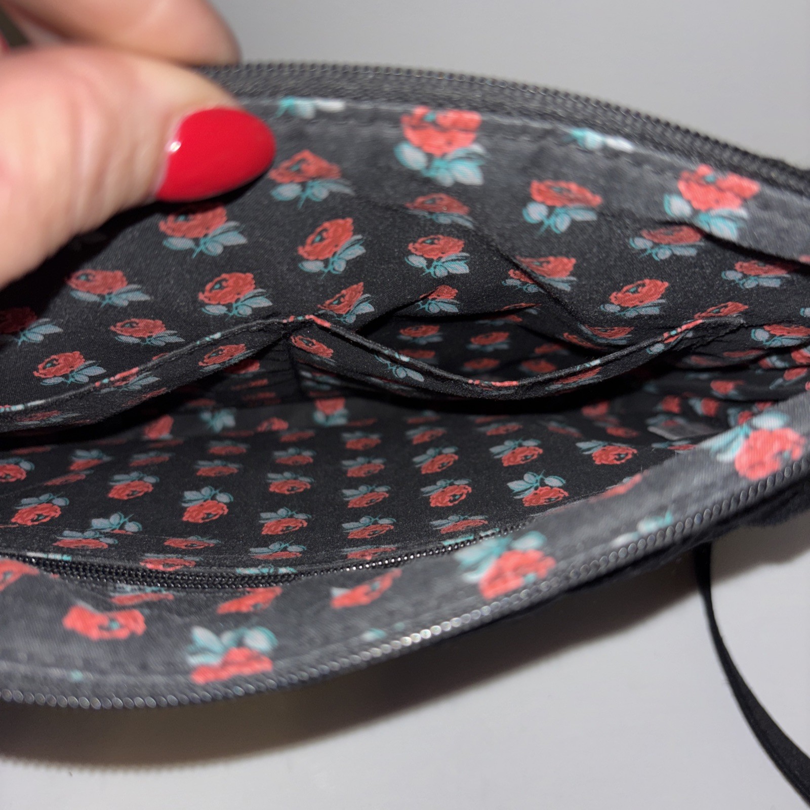 Vera Bradley black quilted crossbody bag,turn-lock closure on the front flap