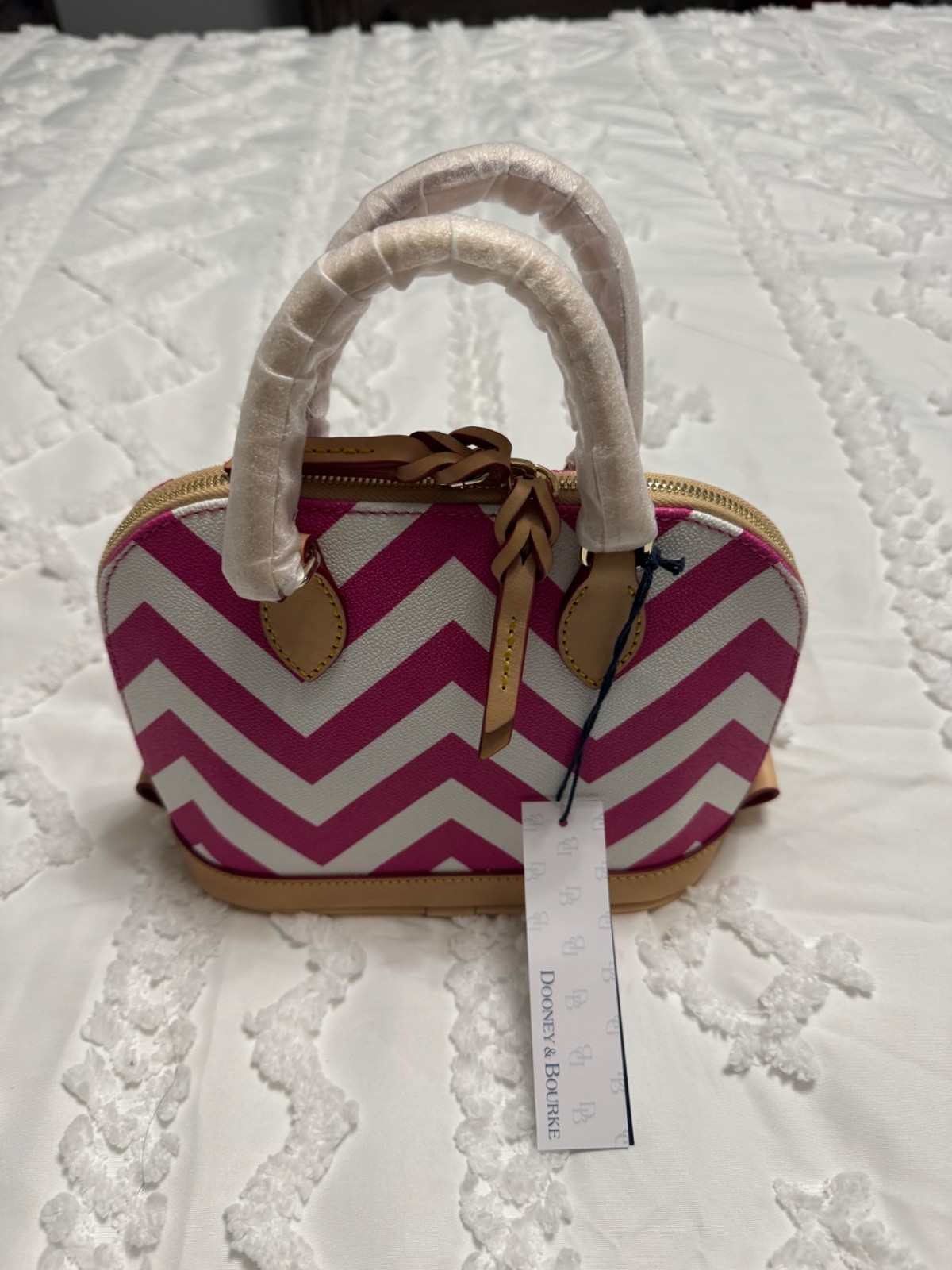 Dooney and Bourke small satchel with shoulder strap. Pet and smoke free home.
