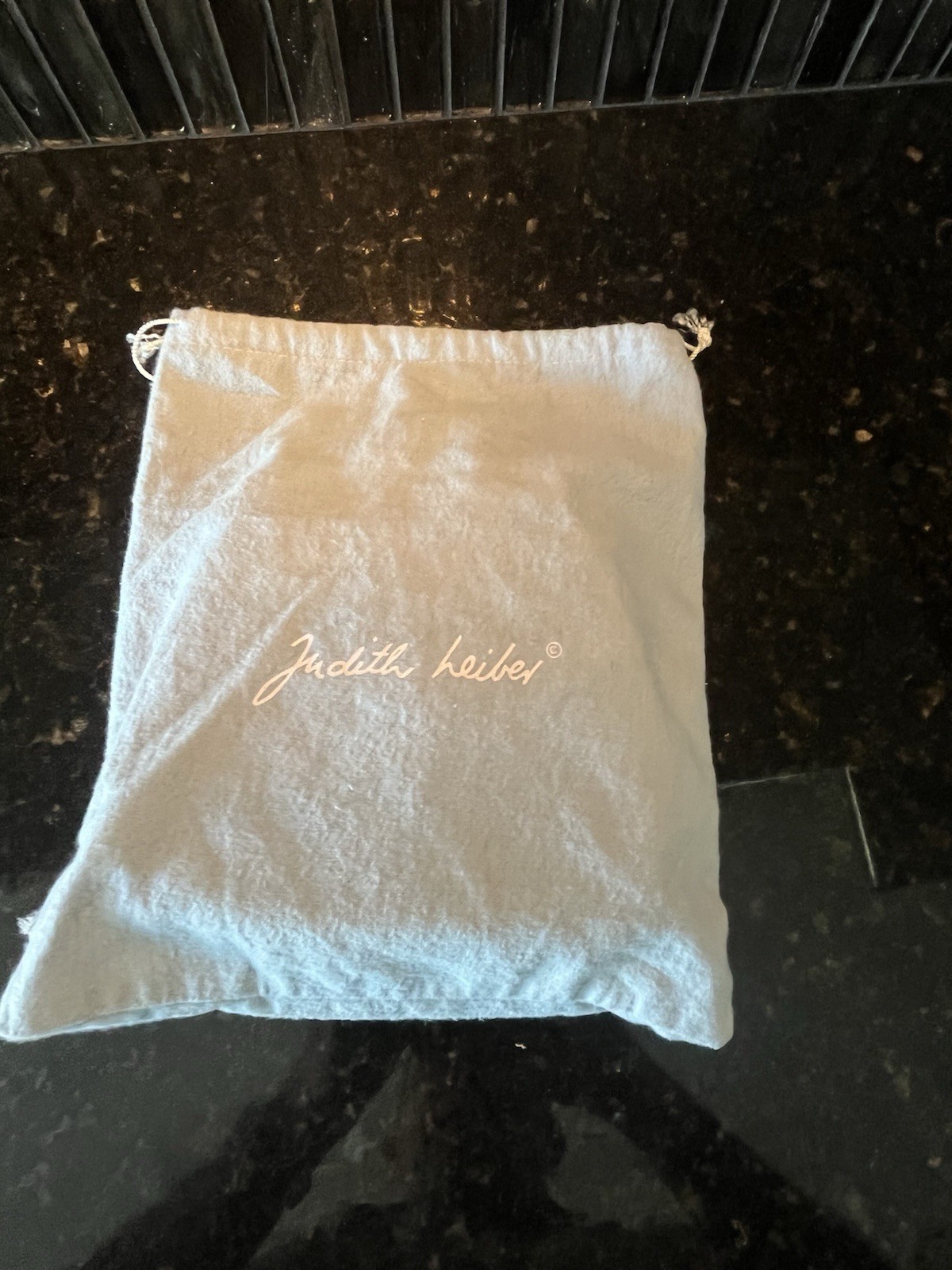 Vintage Judith Leiber satin evening clutch with Sparkling embellishments.