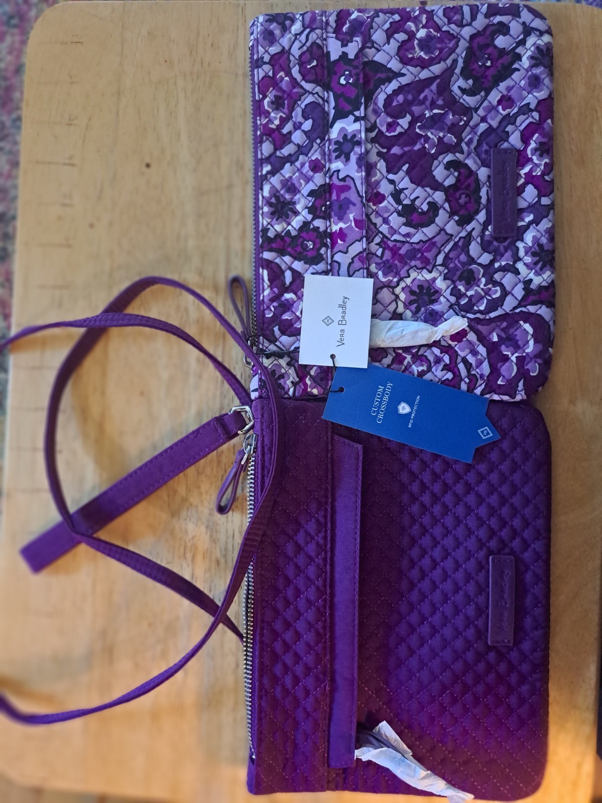 new vera bradley RFID crossbody/wristlet, lilac paisley/purple. New/tags on.