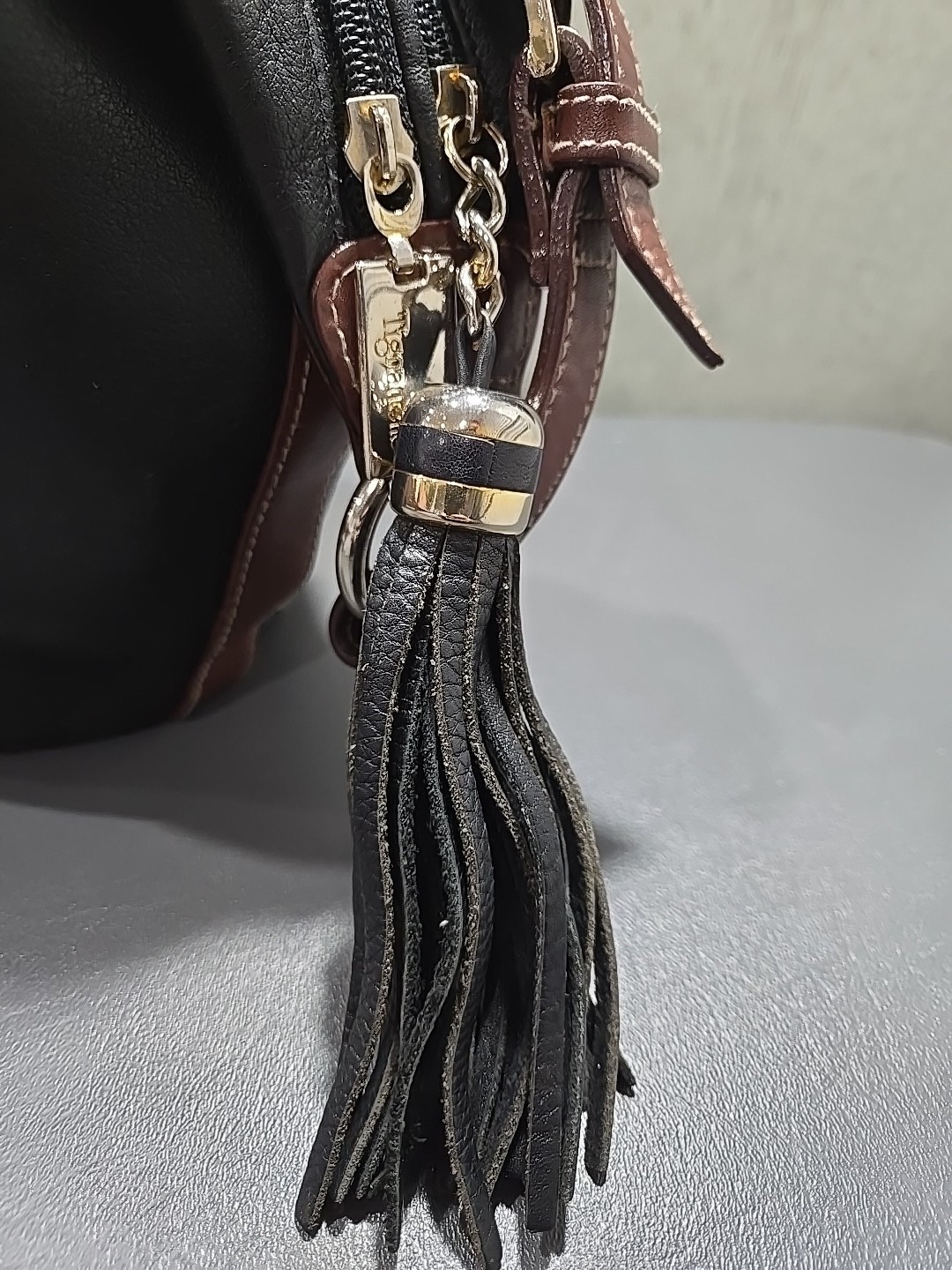 Tignanello Leather Double Zip Hobo Shoulder Bag Black with Brown Trim and Tassle