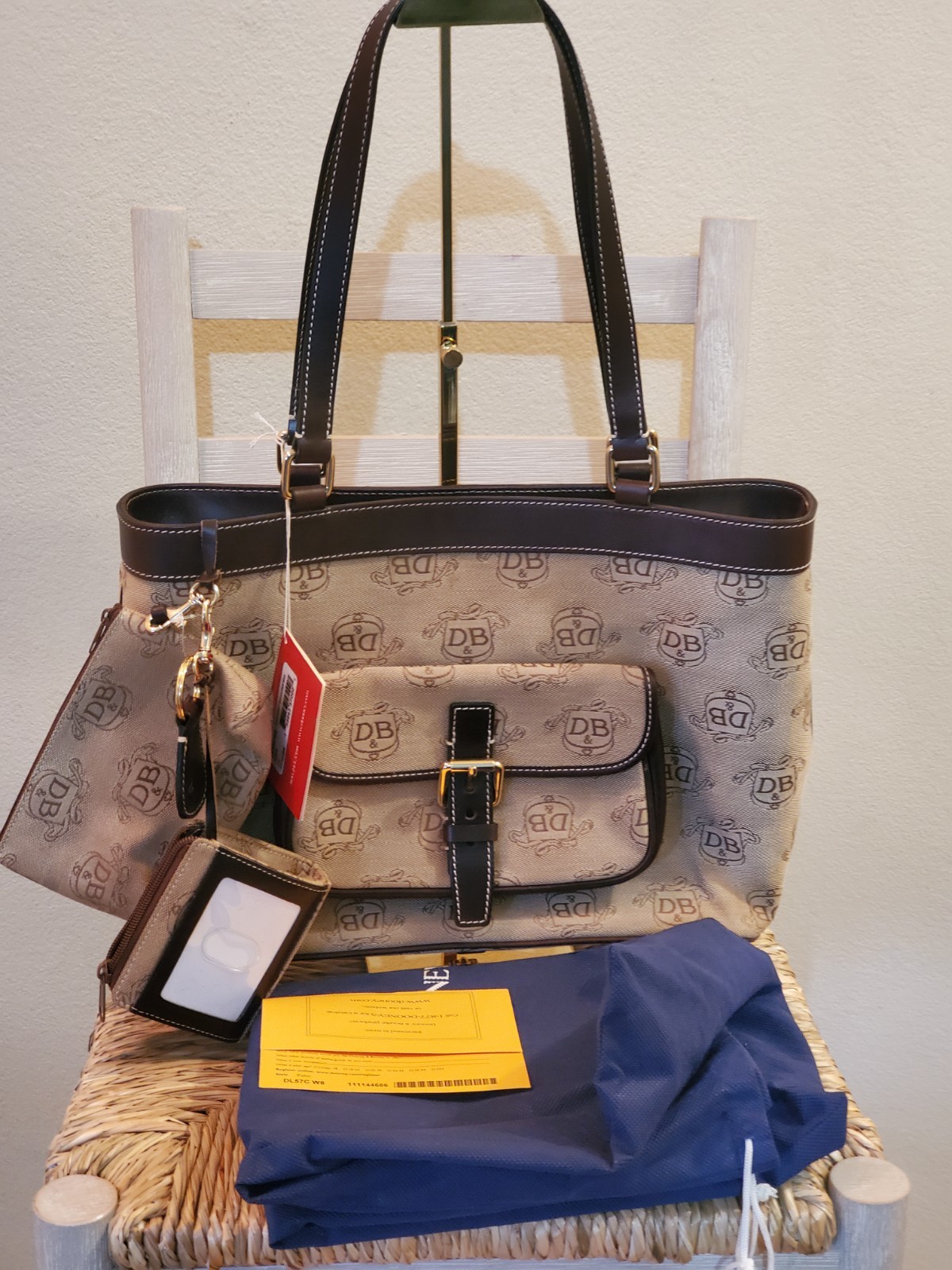 Dooney & Bourke East West Canvas Leather Trim Donegal Crest Tote Full Inclusion