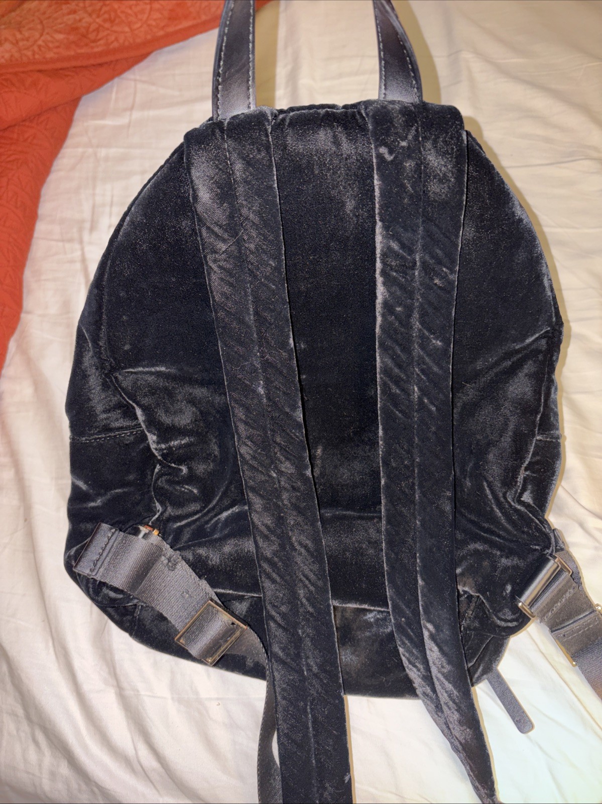 Kate Spade Hartley Black Velvet Backpack with gold zipper details