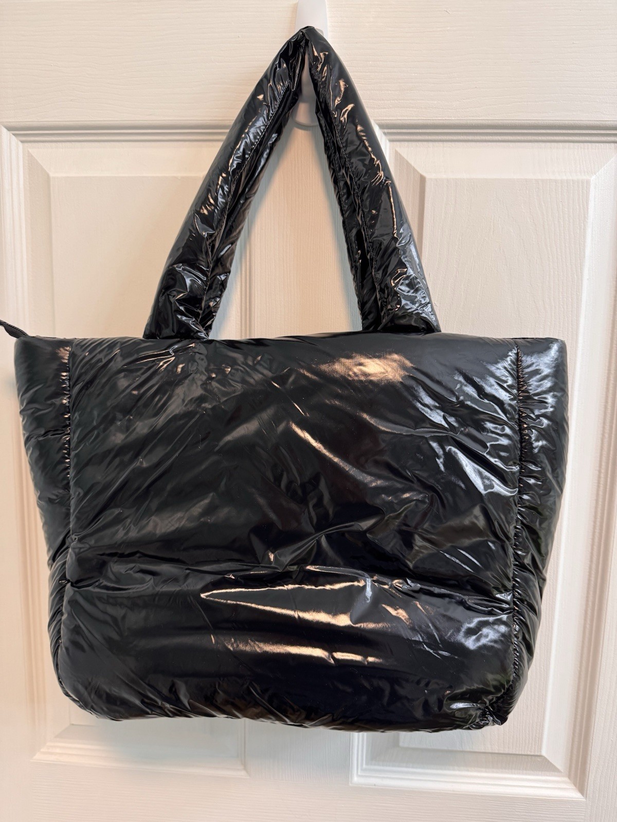 Vince Camuto Puffer Tote Black Zip Close Interior Pocket Open Crisscross Front