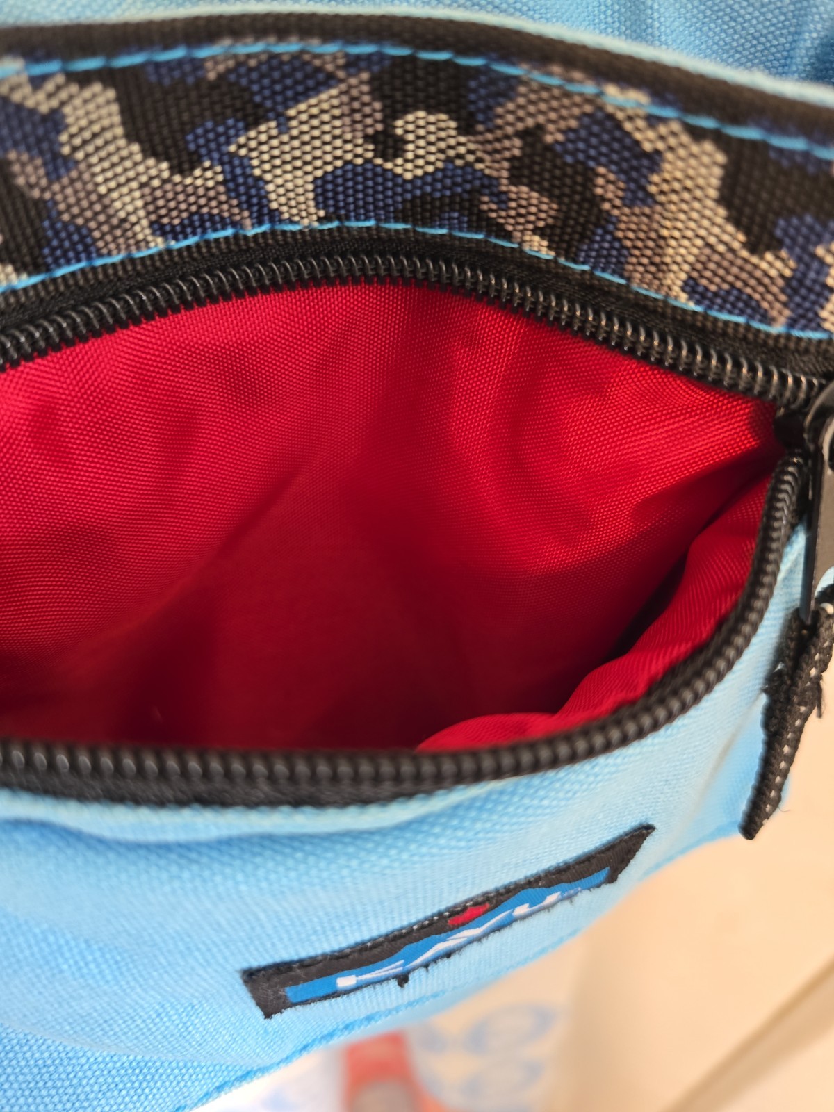 KAVU Keeper Crossbody Blue Teal Animal Print Red Interior Canvas Travel Outdoor